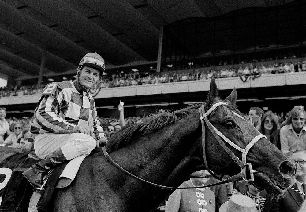  Jockey Ron Turcotte rides Secretariat towards the Winner’s Circle after they captured the Triple Crown for 1973 by winning the Belmont Stakes at Belmont Park in Elmont, N.Y., June 9, 1973, before a crowd of 70,000 fans. (AP Photo) 