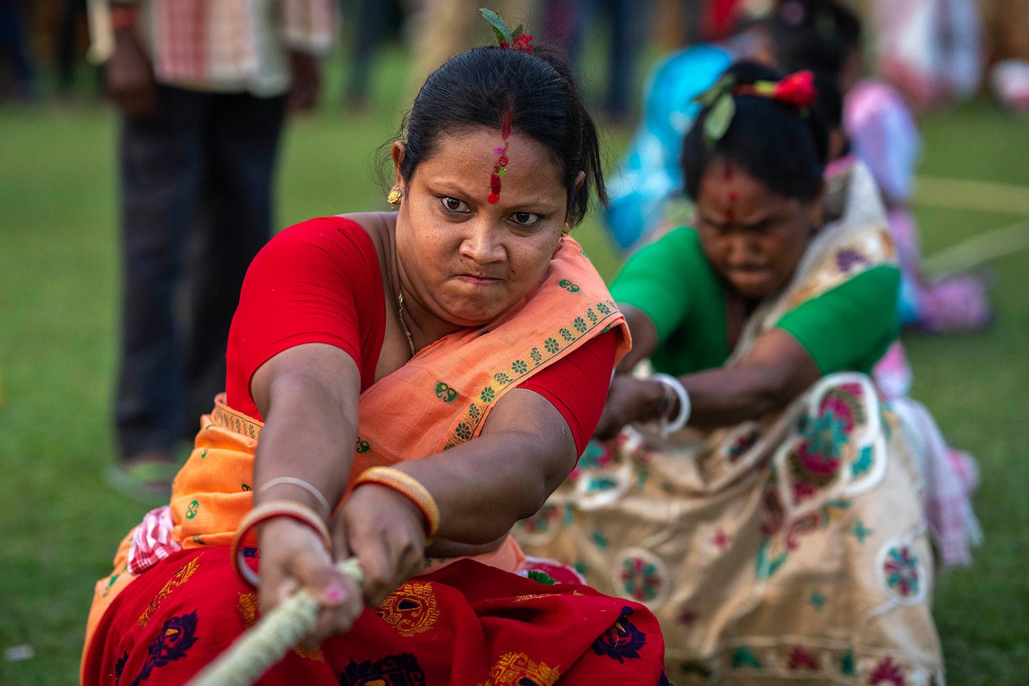  Indian women participate in tug of war during Suwori festival in Boko, west of Guwahati, India, Thursday, April 20, 2023.  (AP Photo/Anupam Nath) 