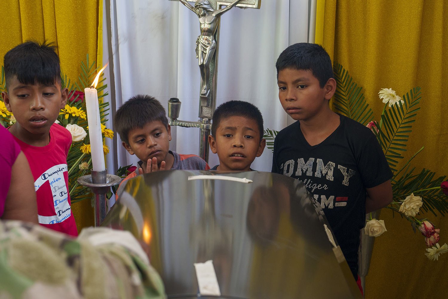  Youths attend the wake of Guatemalan migrant Francisco Rojche at his home in Chicacao, Guatemala, April 12, 2023. Rojche and his uncle Miguel died in a fire while they were held at a Mexican immigration detention center on the Mexico-US border in Ci