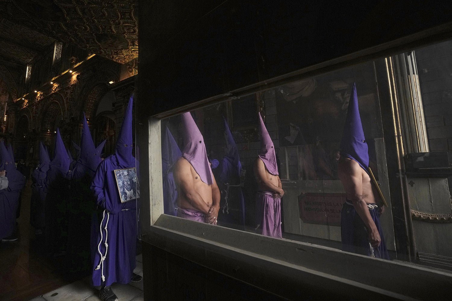  Catholic penitents take part in the Jesus of Great Power procession in Quito, Ecuador, April 7, 2023. Processions and religious floats parade through the streets of villages and cities across the region during Holy Week, commemorating the last week 