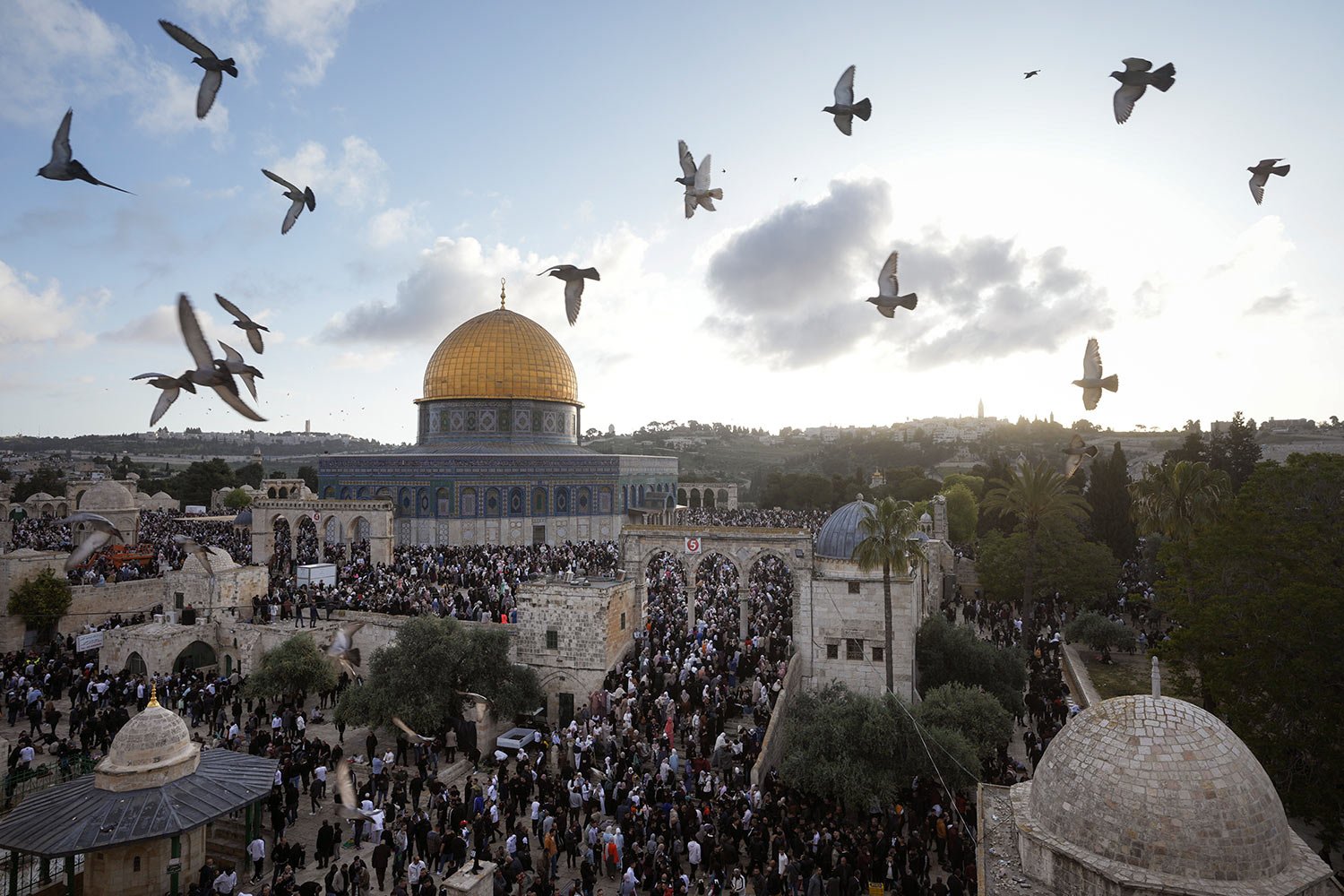  Palestinians attend Eid al-Fitr holiday celebrations by the Dome of the Rock shrine in the Al Aqsa Mosque compound in Jerusalem's Old City, Friday, April 21, 2023.  (AP Photo/Mahmoud Illean) 