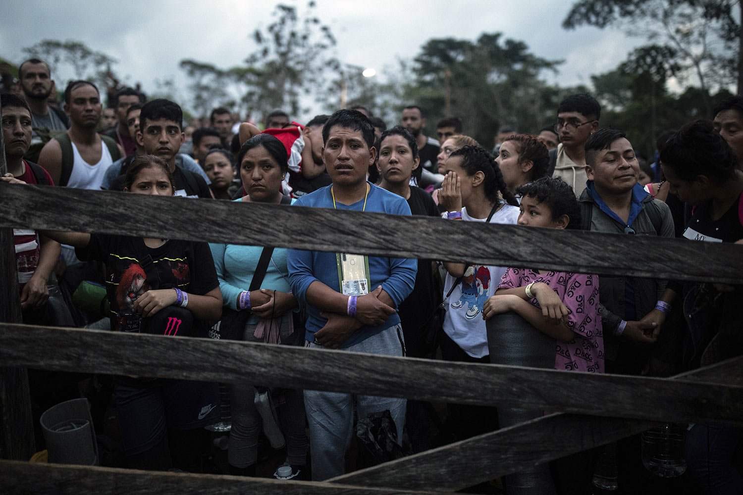  Migrants who plan to start walking across the Darien Gap from Colombia to Panama, in hopes of reaching the U.S., stand at the trailhead camp in Acandi, Colombia, May 9, 2023.  (AP Photo/Ivan Valencia) 