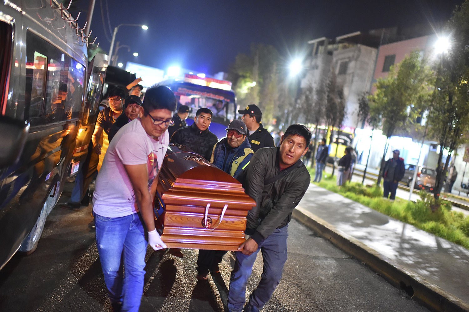  The relatives of miner Clemente Coaquira carry his casket from the morgue in Arequipa, Peru, May 8, 2023. Coaquira was killed during a fire at a gold mine in southern Peru that killed at least 27 workers, Peruvian authorities reported. (AP Photo/Alb