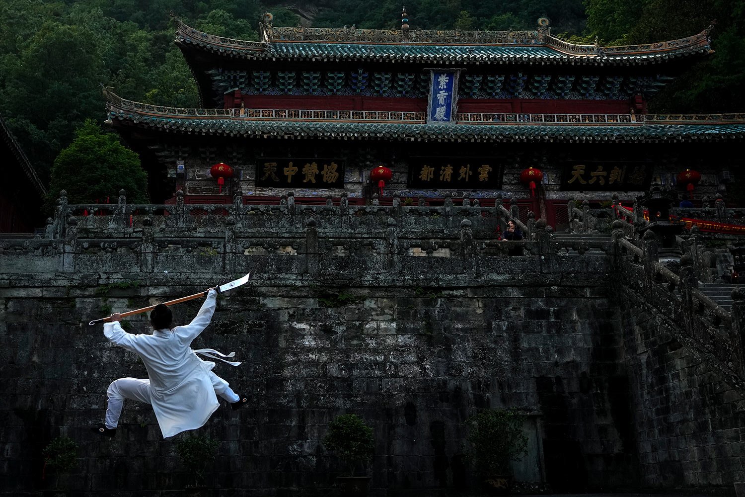  A taoist performs Wudang Tai Chi at Zixiao Palace during a media-organized tour at Wudangshan Mountain in central China's Hubei Province, Thursday, May 11, 2023.  (AP Photo/Andy Wong) 