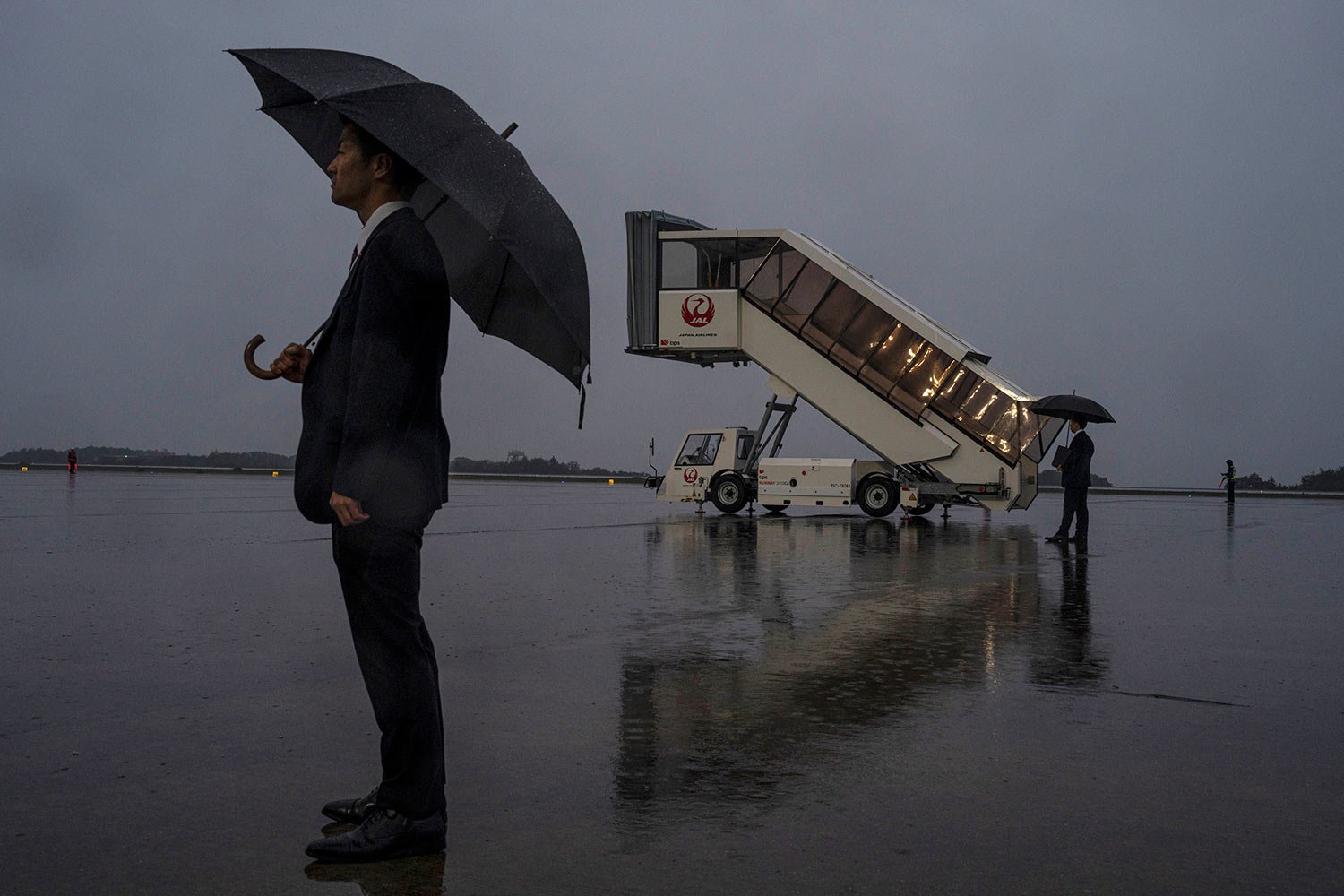  Security stand guard prior to dignitaries arrivals at Hiroshima airport for the G-7 summit, in Hiroshima western Japan, Thursday, May 18, 2023.(AP Photo/Louise Delmotte) 