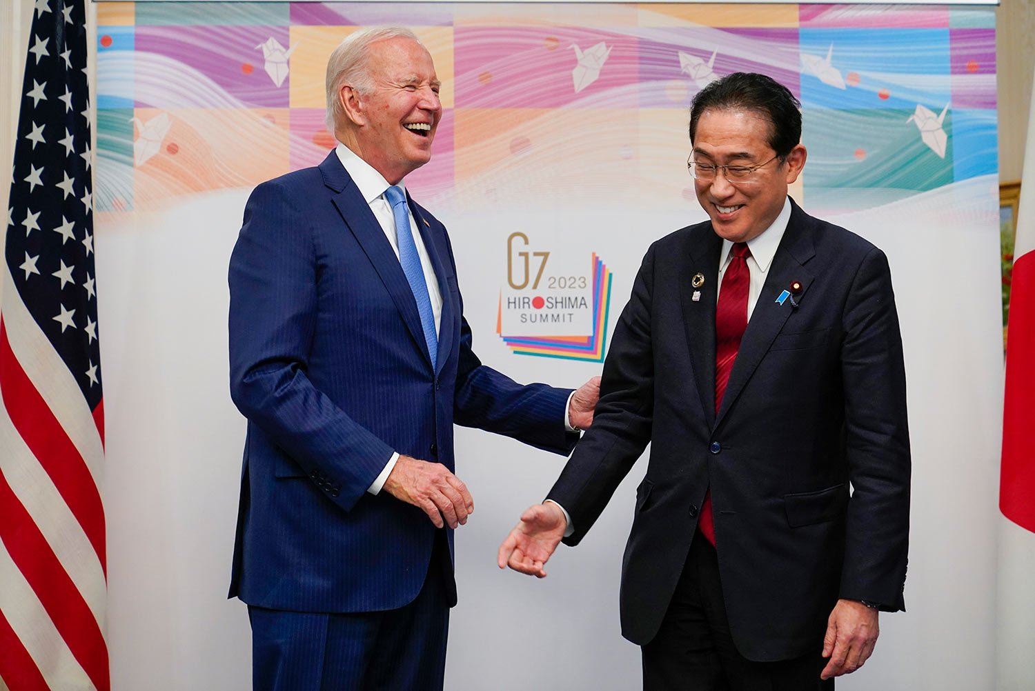  President Joe Biden, left, reacts as he meets with Japan's Prime Minister Fumio Kishida in Hiroshima, Japan, Thursday, May 18, 2023, ahead of the start of the G-7 Summit. (AP Photo/Susan Walsh) 