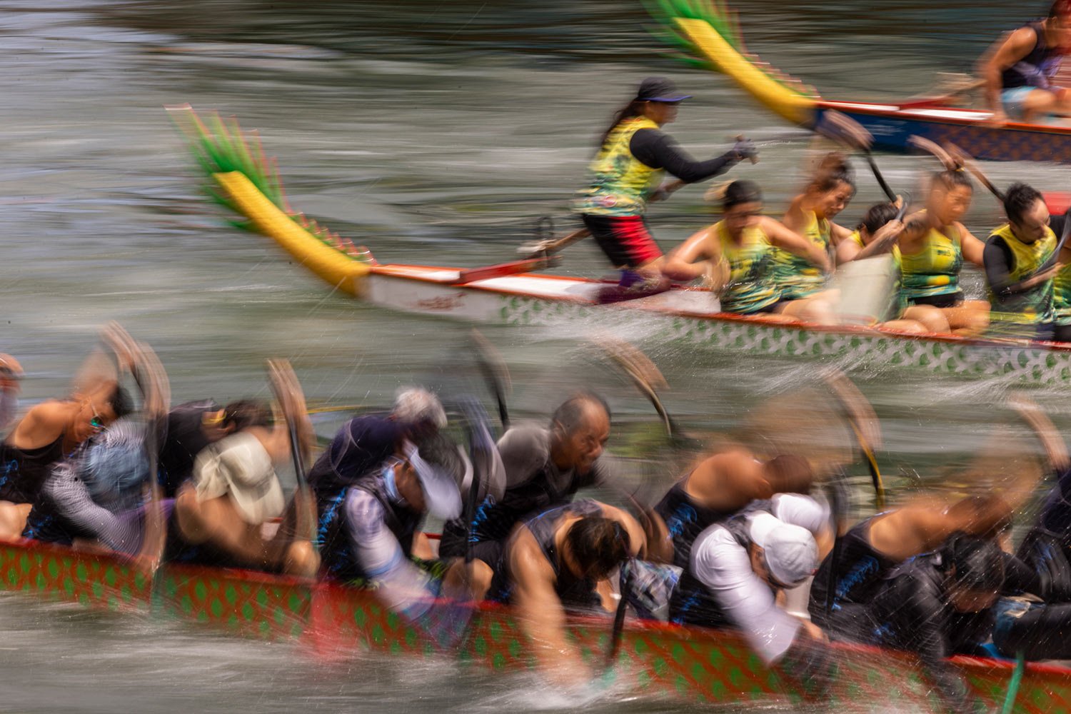 Competitors take part in the annual dragon boat race to celebrate the Tuen Ng festival in Hong Kong, Thursday, June 22, 2023. (AP Photo/Louise Delmotte)