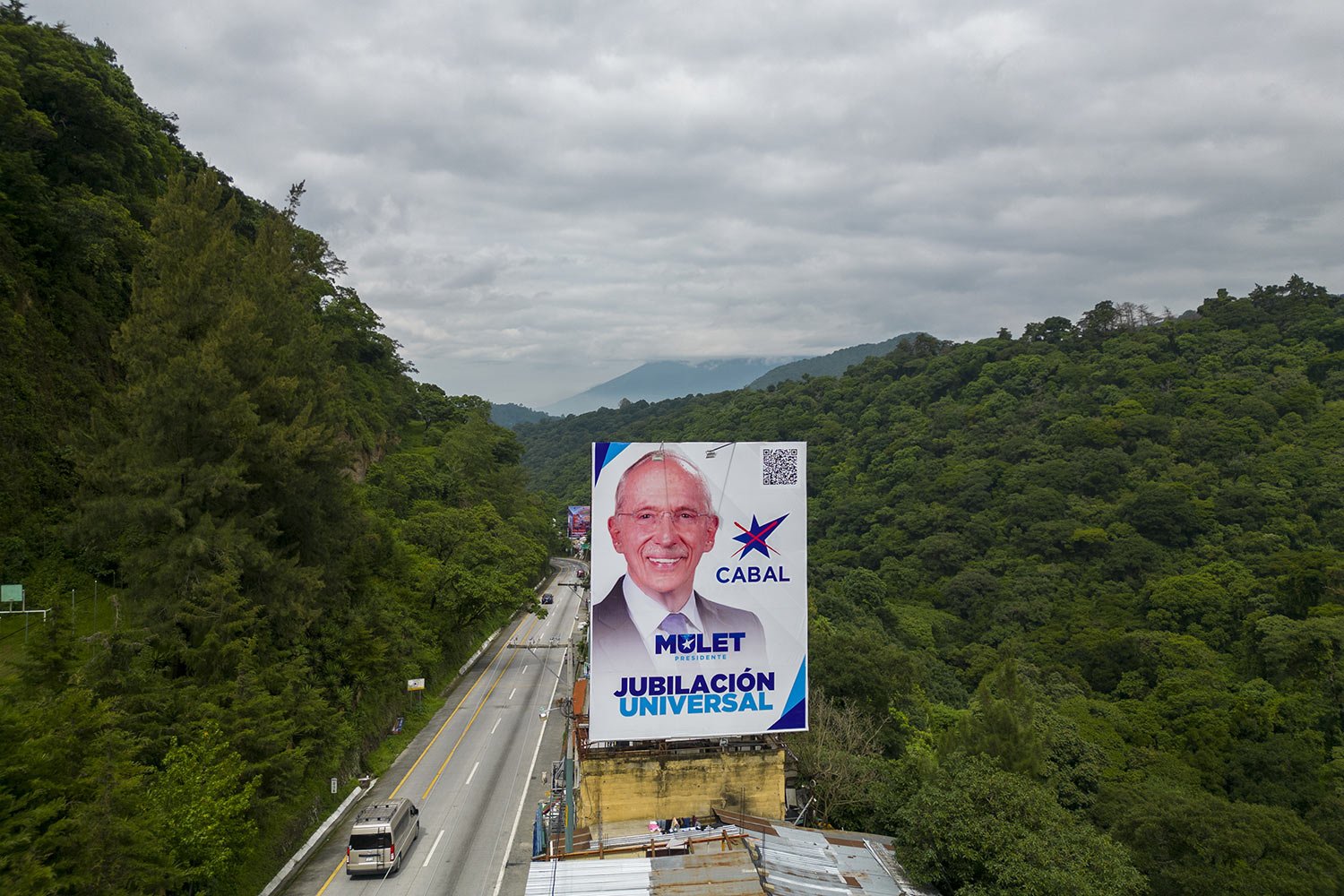 A campaign billboard promoting  Edmond Mulet, presidential candidate of the Cabal party, towers over a highway in Santa Lucia Milpas Altas, Guatemala, June 24, 2023. Guatemalans go to the polls on June 25. (AP Photo/Moises Castillo) 