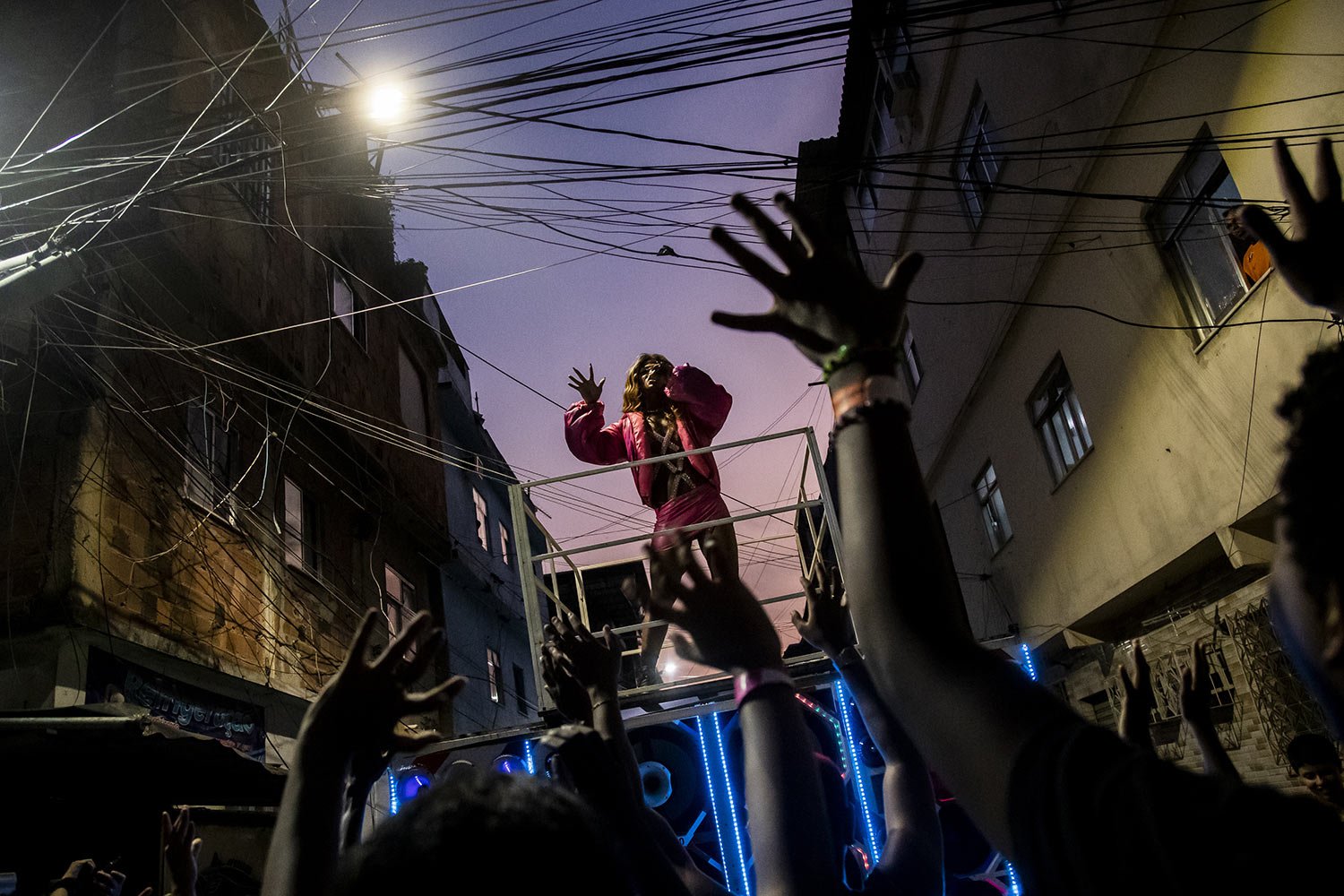 Artist Preta Queenb Rull performs during an LGBT+ artistic show entitled "Noite das Estrelas" or the Night of the Stars, at the Mare Favela complex, in Rio de Janeiro, Brazil, June 25, 2023. (AP Photo/Bruna Prado)