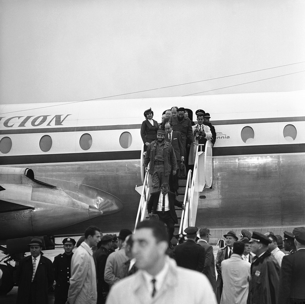 Premier Fidel Castro of Cuba leads members of his delegation from a plane at Idlewild Airport in New York City on Sept. 18, 1960, after arriving for the United Nations General Assembly Meeting. Castro’s plane was taken to an isolated hangar to avoid
