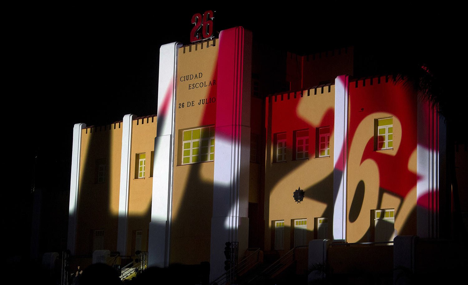  The Moncada military barracks are illuminated before sunrise during a ceremony marking the 70th anniversary of the assault on the barracks, now a school, in Santiago, Cuba, Wednesday, July 26, 2023. Cuba marks the 1953 rebel attack led by Fidel and 