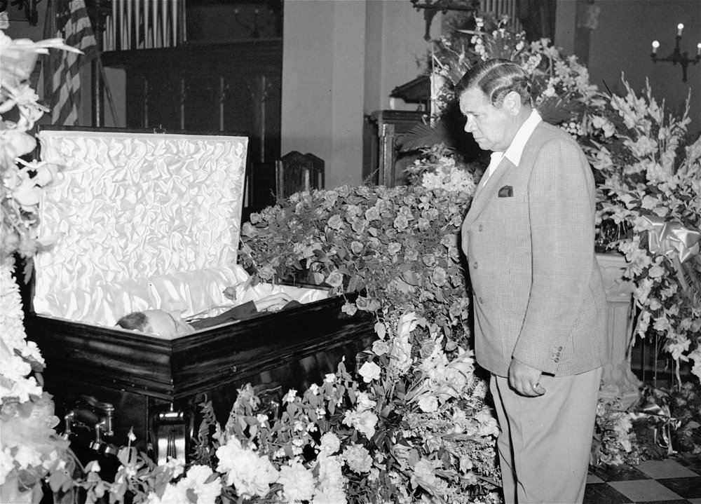  Babe Ruth pauses beside the body of one time New York Yankee teammate, Lou Gehrig, at Christ Episcopal Church in the Bronx, New York, June 3, 1941.  (AP Photo) 