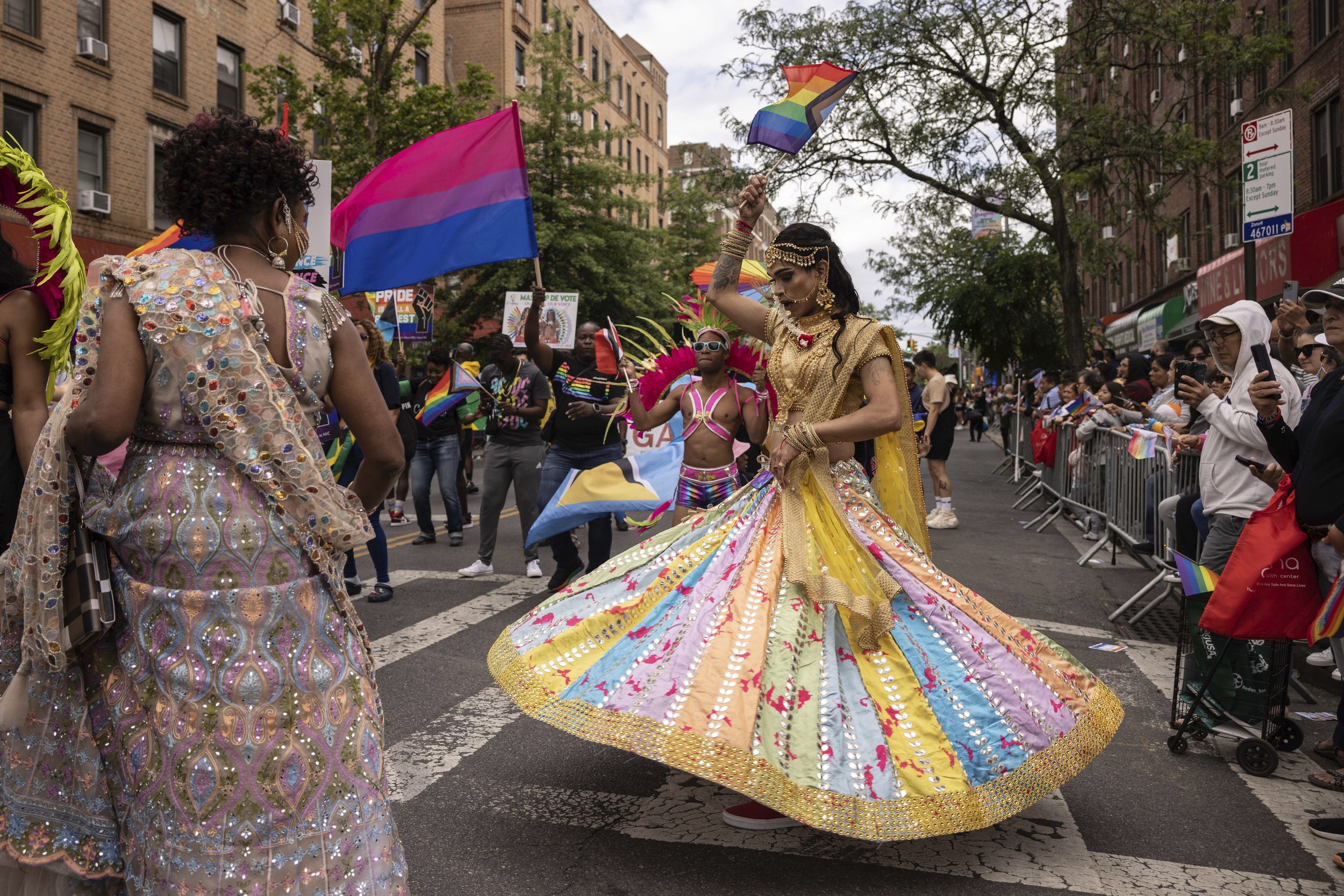   Performers dance as they march during the 31st annual Queens Pride Parade and Multicultural Festival, Sunday, June. 4, 2023, in New York. (AP Photo/Yuki Iwamura) 