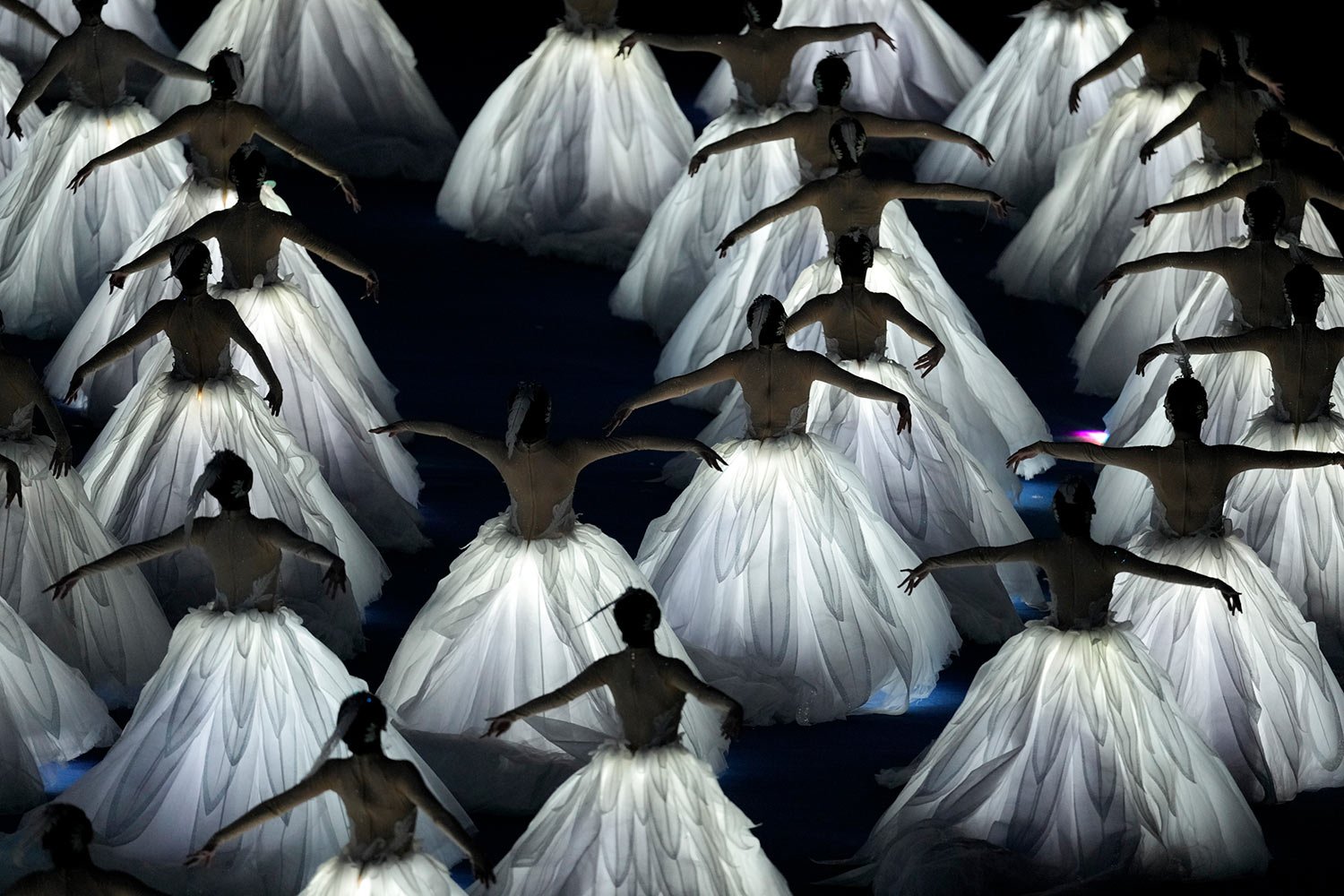  Artists perform during the opening ceremony of the 19th Asian Games in Hangzhou, China, Saturday, Sept. 23, 2023. (AP Photo/Eugene Hoshiko) 