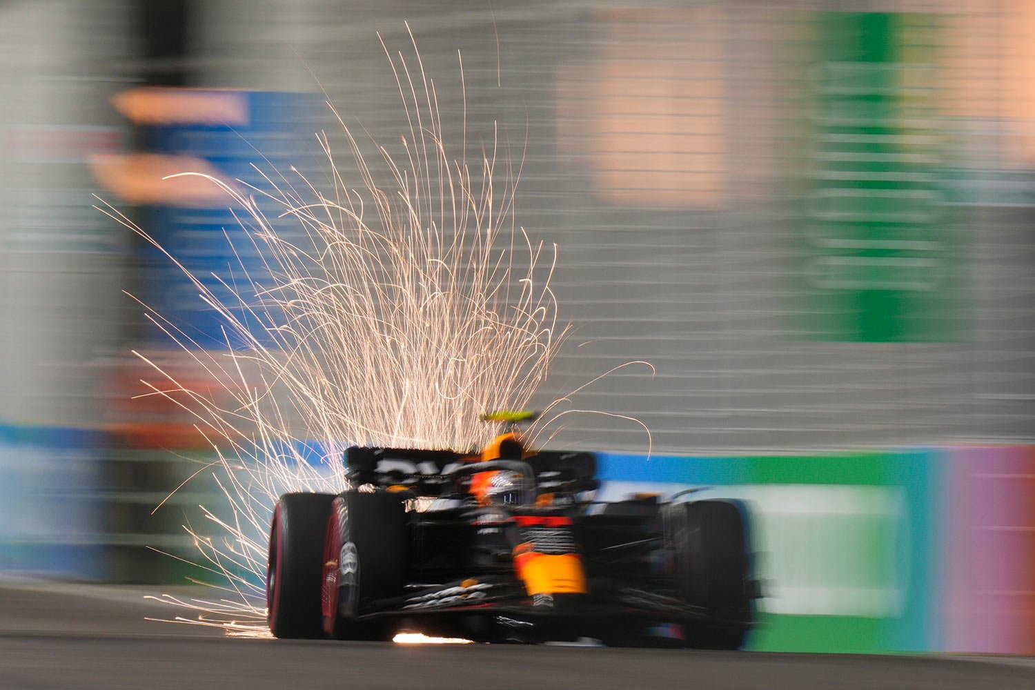  Red Bull driver Sergio Perez of Mexico steers his car during the qualifying session of the Singapore Formula One Grand Prix at the Marina Bay circuit, Singapore, Saturday, Sept. 16, 2023. (AP Photo/Vincent Thian) 