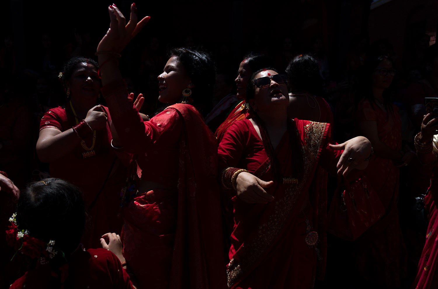  Women dance during Teej festival at Pashupatinath temple in Kathmandu, Nepal, Monday, Sept. 18, 2023. (AP Photo/Niranjan Shrestha) 