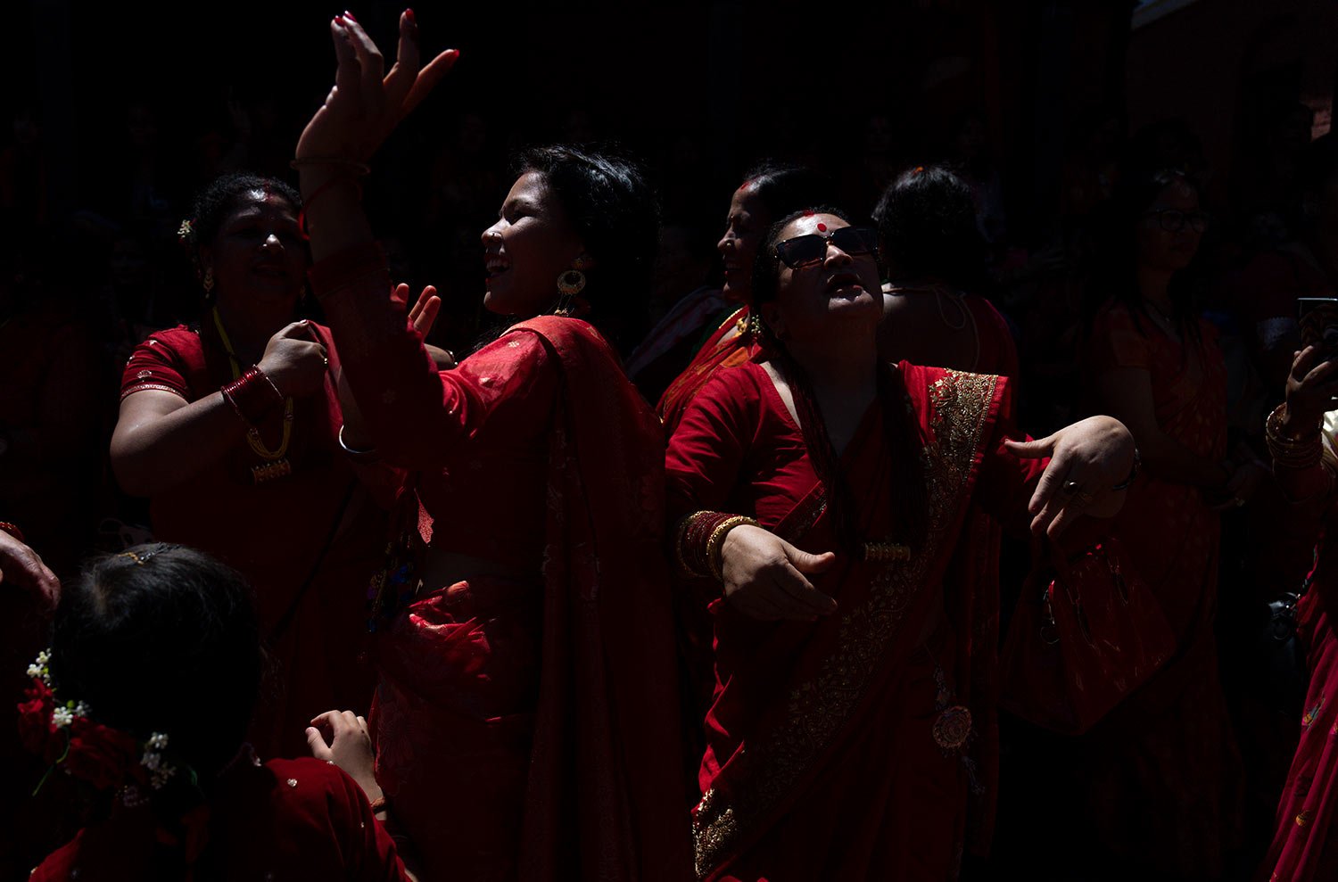 Women dance during Teej festival at Pashupatinath temple in Kathmandu, Nepal, Monday, Sept. 18, 2023. (AP Photo/Niranjan Shrestha)