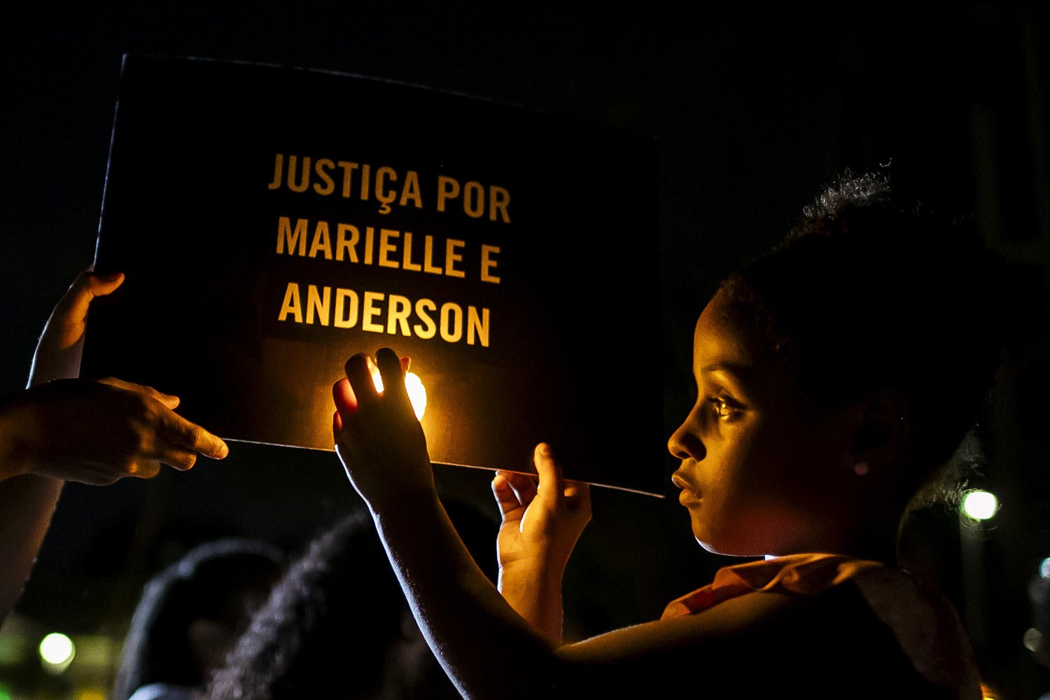  A child takes part in an act to mark the 2000th day since the murder of Councilwoman Marielle Franco and her driver, Anderson Gomes, in Rio de Janeiro, Brazil, Sept. 2, 2023. (AP Photo/Bruna Prado) 