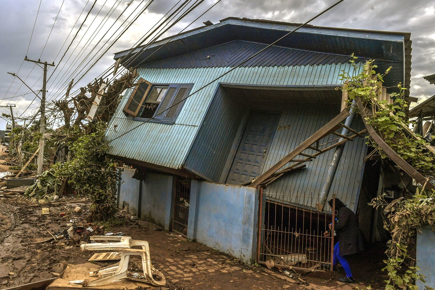  A home leans in on itself after  a deadly cyclone in Roca Sales, Brazil, Sept. 7, 2023. Flooding from a cyclone washed away homes and trapped motorists. (AP Photo/Wesley Santos) 