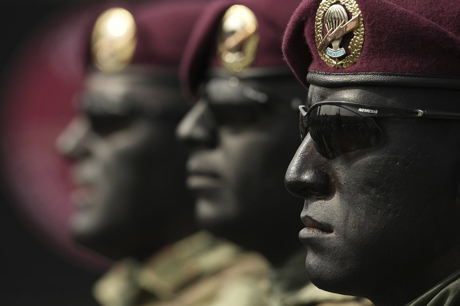  Soldiers in face paint wait for the start of the annual Independence Day military parade at the Zocalo in Mexico City, Sept. 16, 2023. (AP Photo/Fernando Llano) 
