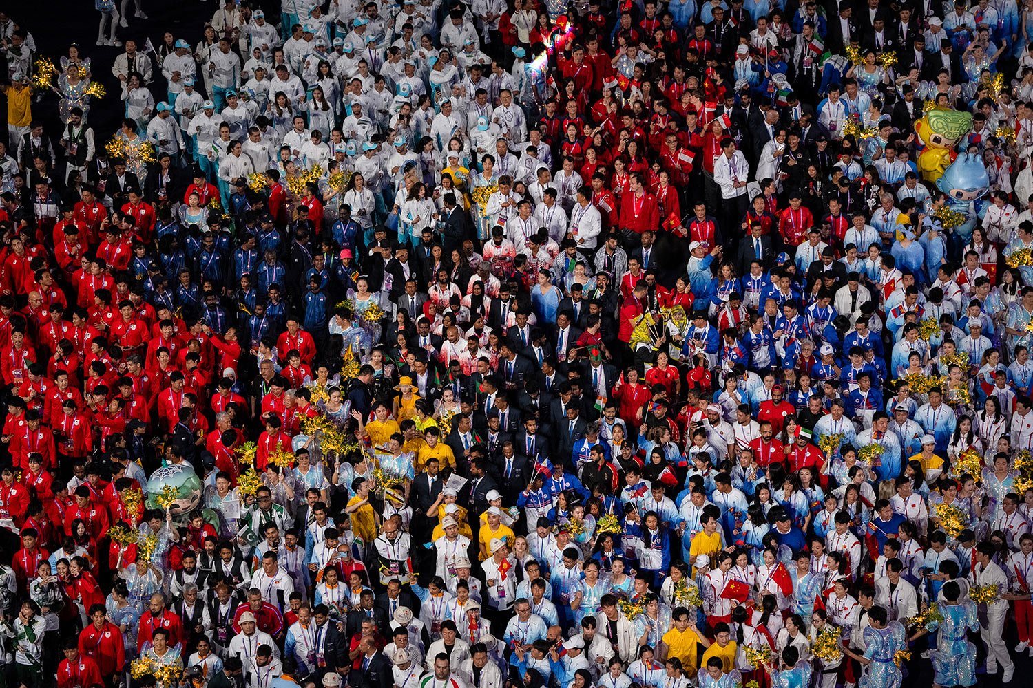  Athletes and team officials from participating countries gather for the closing ceremony of the 19th Asian Games in Hangzhou, China, Sunday, Oct. 8, 2023. (AP Photo/Louise Delmotte) 