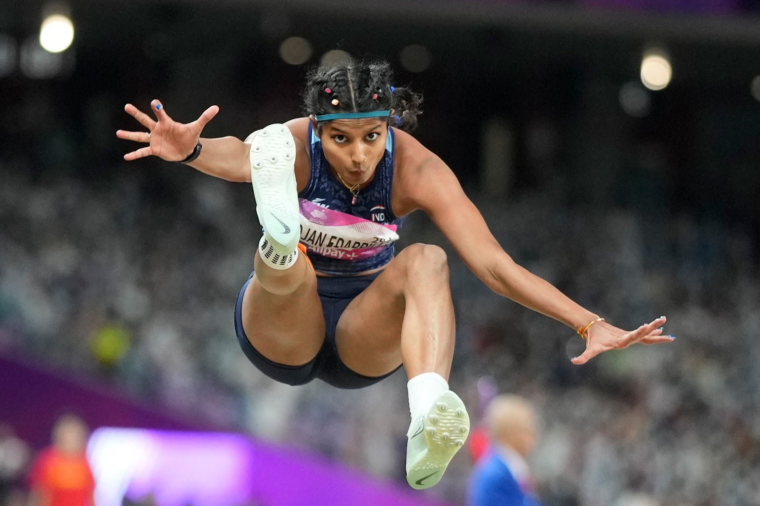  India's Ancy Sojan Edappilly competes during the women's long jump final at the 19th Asian Games in Hangzhou, China, Monday, Oct. 2, 2023. (AP Photo/Lee Jin-man) 