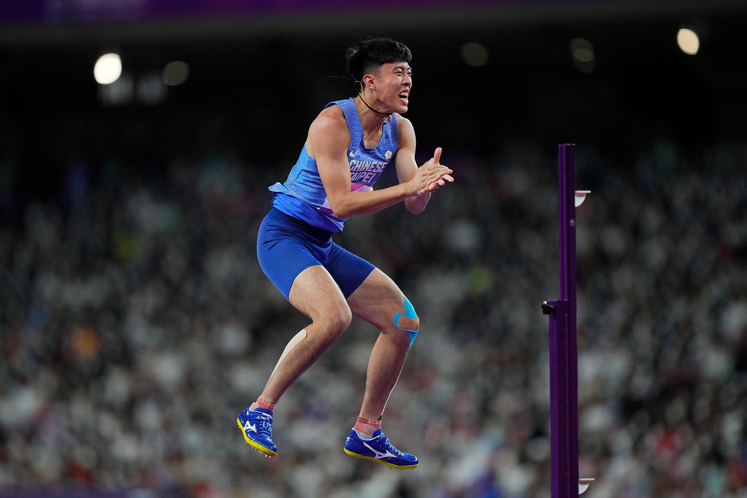  Taiwan's Cho Chia-Hsuan reacts during the men's decathlon high jump at the 19th Asian Games in Hangzhou, China, Monday, Oct. 2, 2023. (AP Photo/Vincent Thian) 