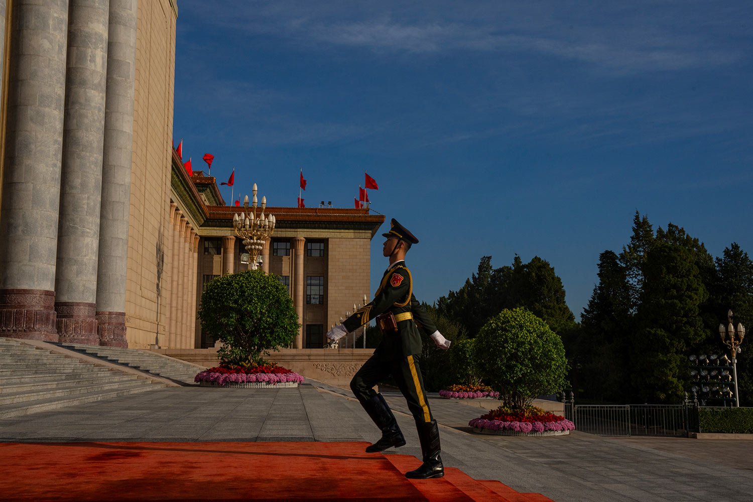  A Chinese soldier marches outside the Great Hall of the People prior to the opening ceremony of the Belt and Road Forum in Beijing, Wednesday, Oct. 18, 2023. (AP Photo/Louise Delmotte) 
