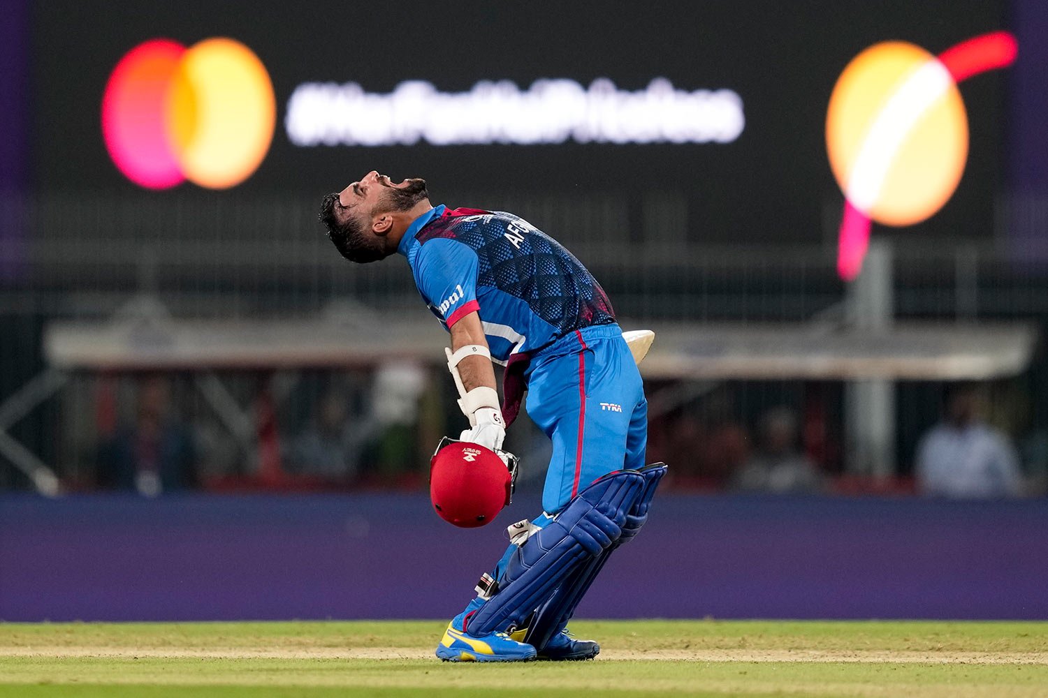  Afghanistan's captain Hashimatullah Shahidi celebrates their win against Pakistan during the ICC Men's Cricket World Cup match between Pakistan and Afghanistan in Chennai, India, Monday, Oct. 23, 2023. (AP Photo/Eranga Jayawardena) 