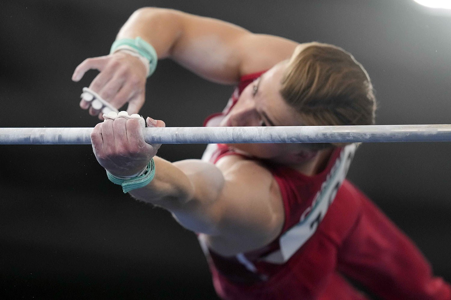  Canada's Felix Dolci competes on the uneven bars during the men’s artistic gymnastics all-around final at the Pan American Games in Santiago, Chile, Oct. 23, 2023. Dolci took the gold. (AP Photo/Martin Mejia) 