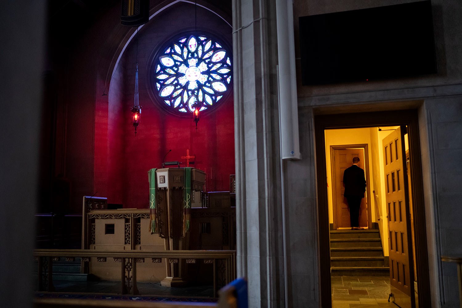  Rev. Stephen Cady walks into the sacristy at Asbury First United Methodist Church, Monday, Aug. 21, 2023, in Rochester, N.Y. (AP Photo/David Goldman)  