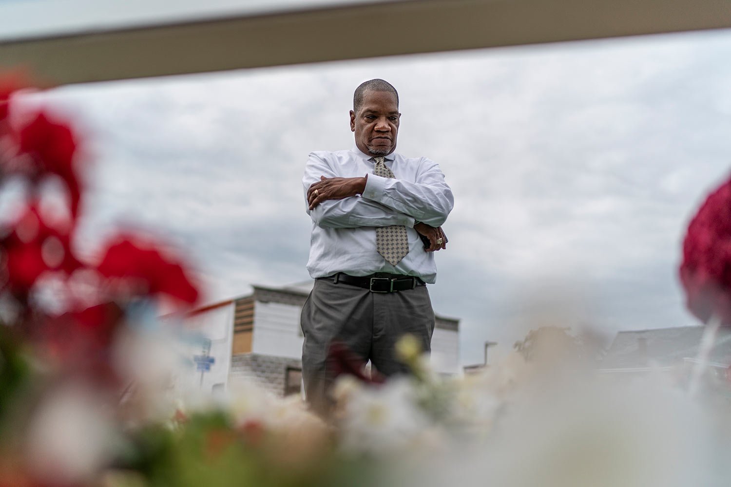  Rev. Jimmie Hardaway Jr. stands at a memorial to the 10 people killed when a shooter targeted Black shoppers at a Tops supermarket, Sunday, Aug. 20, 2023, in Buffalo, N.Y. (AP Photo/David Goldman)  