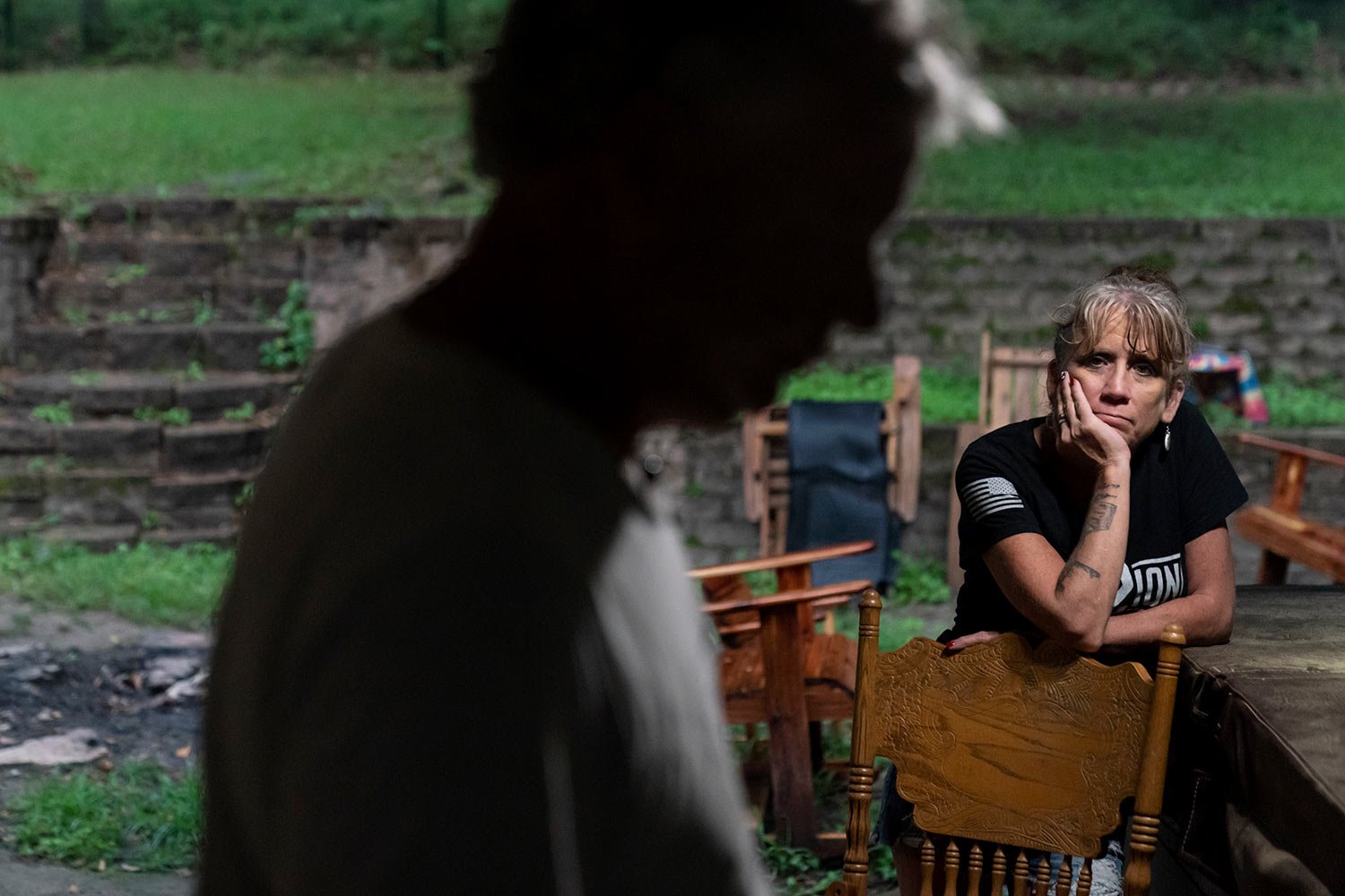  Barbie Rohde, right, looks toward her husband, Robert, after they returned home from a festival where they volunteered for Mission-22, a nonprofit that aims to end military and veteran suicide, Saturday, June 10, 2023, in Flint, Texas. (AP Photo/Dav