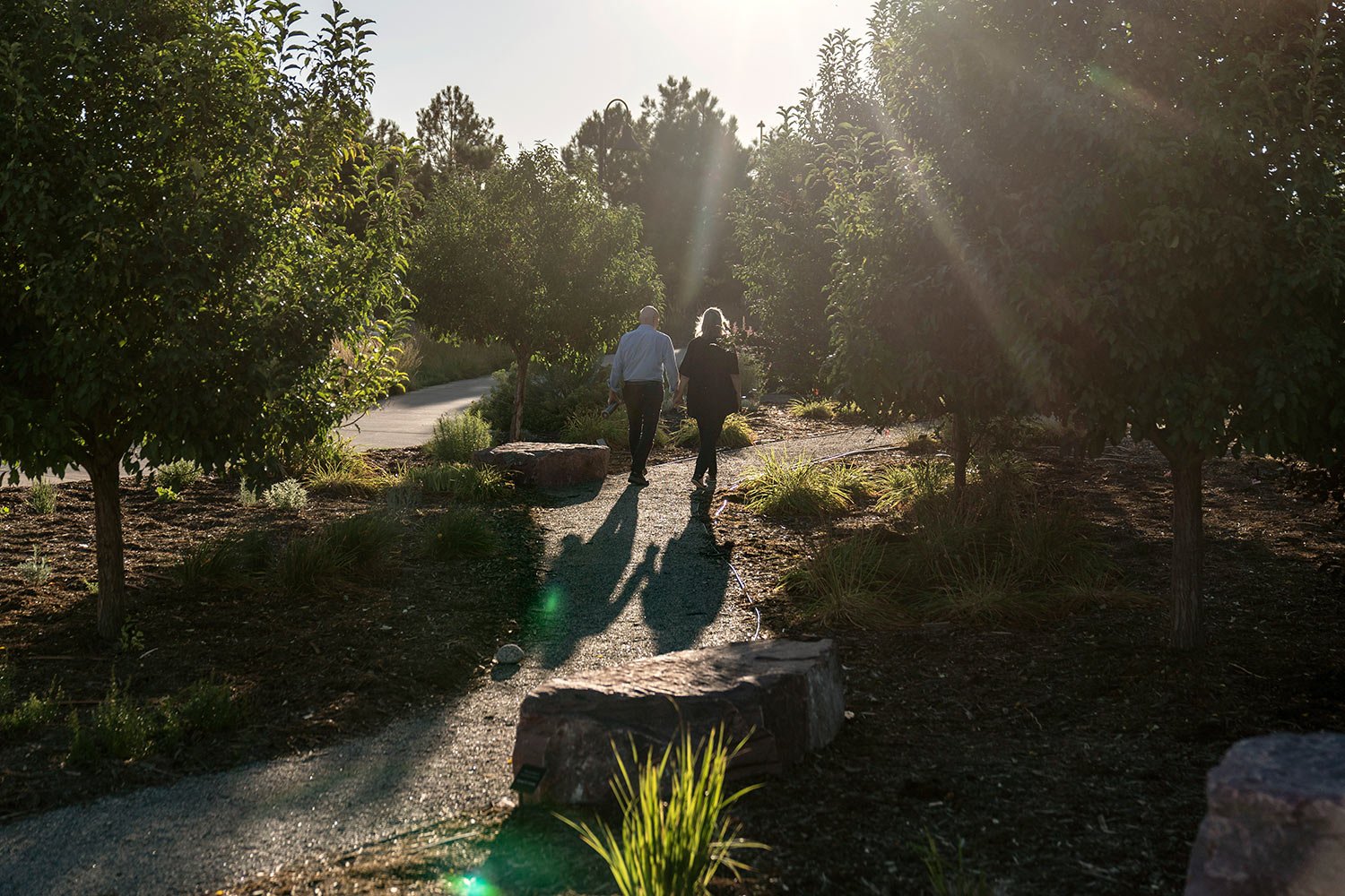  Lonnie, left, and Sandy Phillips, walk through a memorial garden for the victims killed and injured in the 2012 mass shooting at an Aurora, Colorado movie theater, including Sandy’s daughter, Jessica Ghawi, Tuesday, Sept. 5, 2023, in Aurora, Colo. (