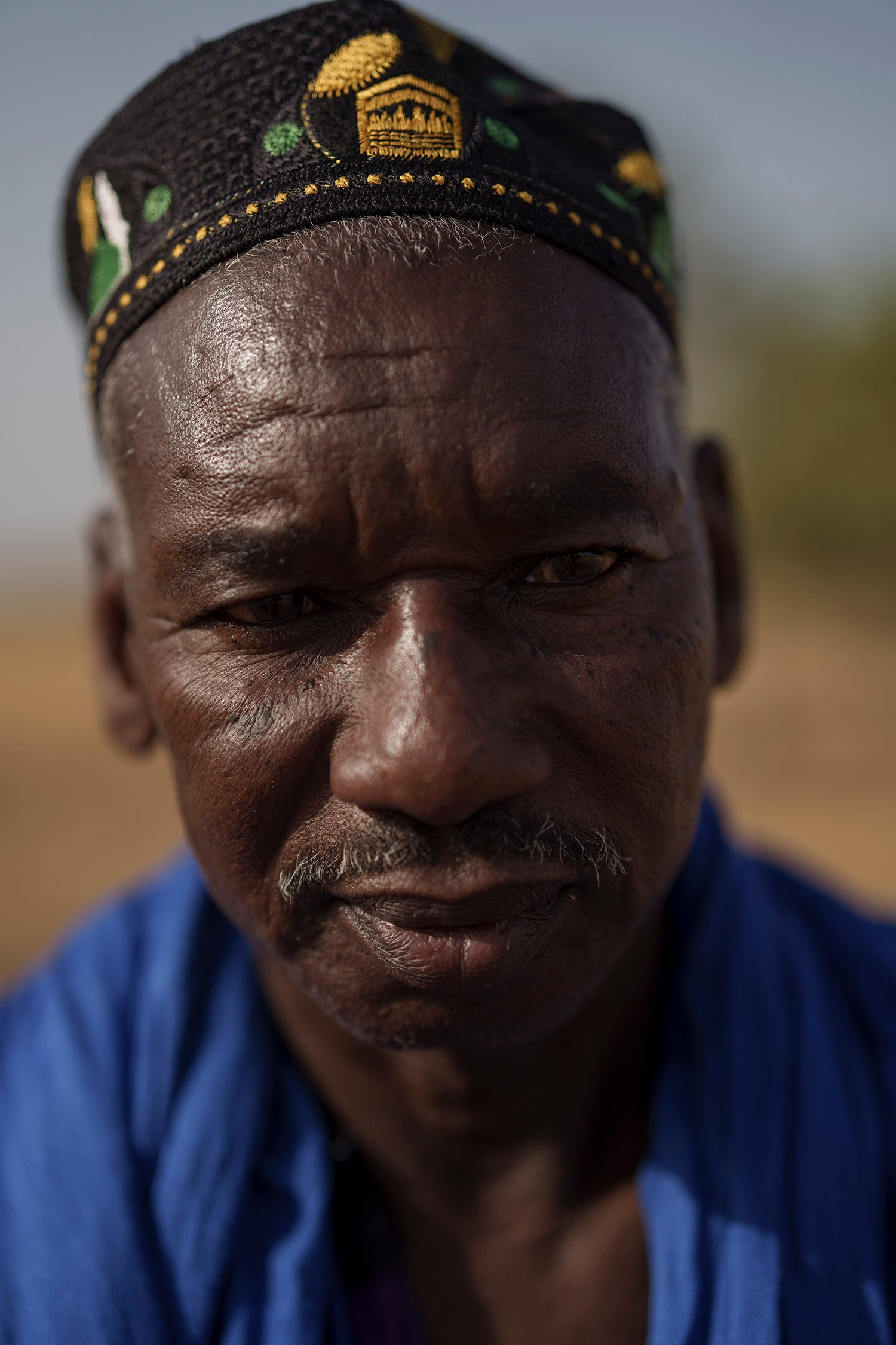  Mamadou Samba Sow, 63, stands for a portrait in the village of Anndiare, in the Matam region of Senegal, Thursday, April 13, 2023. A father of fourteen children, the herder who came from Mauritania to Senegal eighteen years ago says that before rais