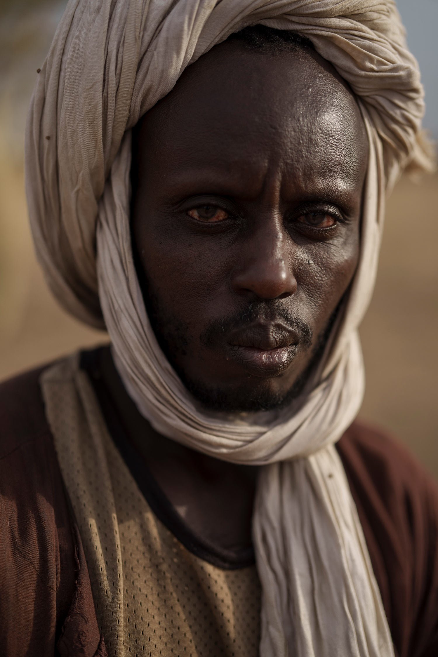  Oumar Abdoulaye Sow, stands for a portrait in the village of Fete Forrou, in the Matam region of Senegal, Tuesday, April. 11, 2023. For the 43-year-old, being a herder is something that the Fulani people have learned from their parents, raising live