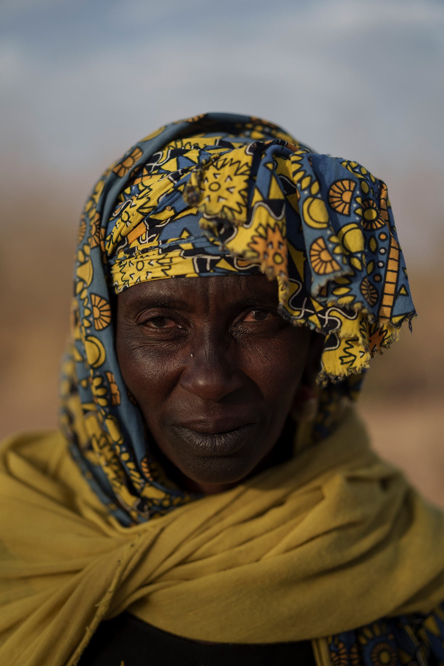  Maary Kalidou Ndiaye stands for a portrait in the village of Yawara Dieri, in the Matam region of Senegal, Saturday, April 15, 2023. The 50-year-old wife of Amadou Ndiaye says some of her main tasks are to take care of the food, fetch water, and pre