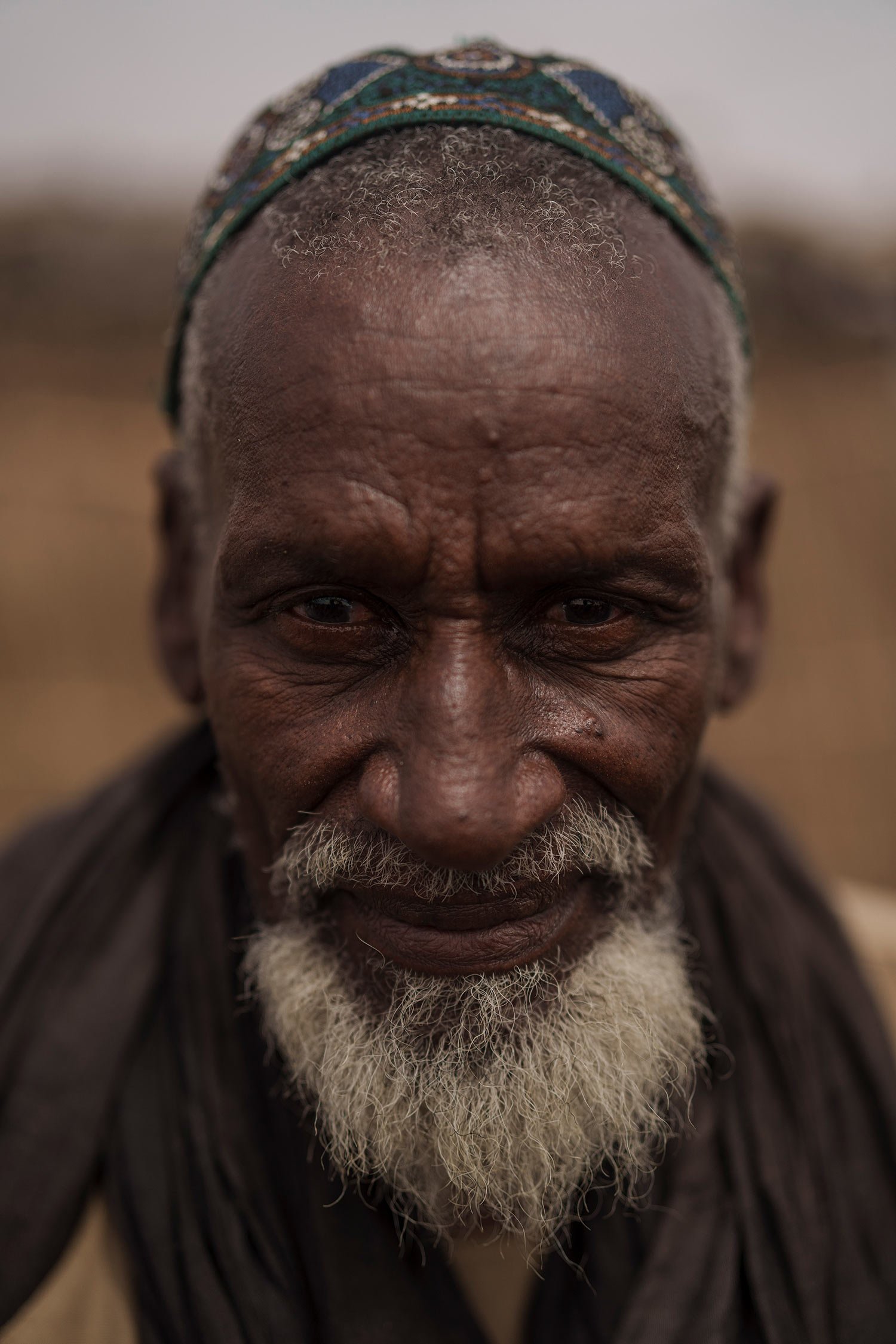  Pate Ba stands for a portrait at a local market near a water station known as Bem Bem, in the Matam region of Senegal, Wednesday, April. 19, 2023. The 70-year old herder says that the one of the main difficulties is the lack of rain but when the rai