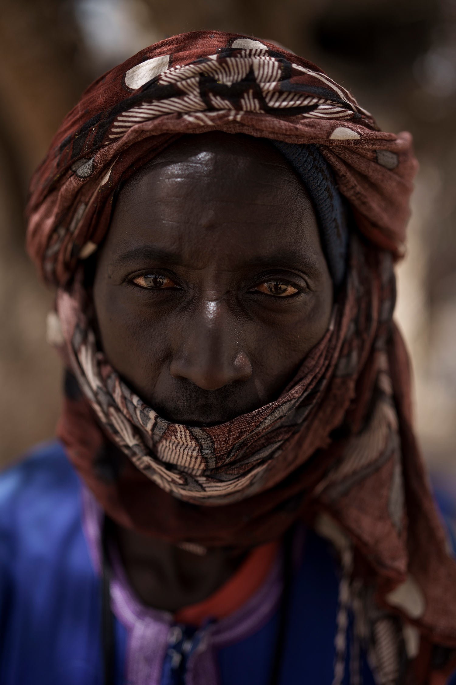  Suleymane Ba stands for a portrait at a local market near a water station known as Bem Bem, in the Matam region of Senegal, Wednesday, April. 19, 2023. For the 43-year-old herder, pastoralism is an inherited tradition that has its advantages and dis