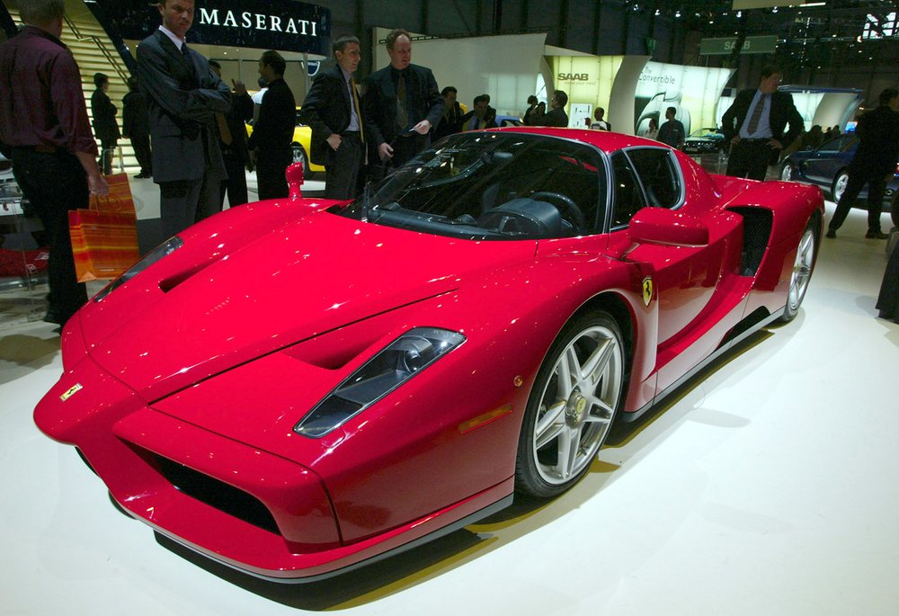  The 'Enzo' Ferrari is shown at the 73rd Geneva International Motor Show Tuesday, March 4, 2003.  (AP Photo/Winfried Rothermel) 
