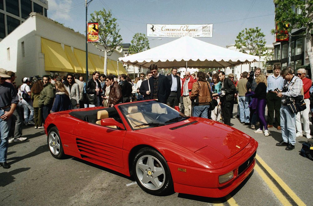  The new Ferrari 348 Spider convertible makes its debut on Rodeo Drive in Beverly Hills, Calif., Saturday, Feb. 27, 1993. (AP Photo/Douglas C. Pizac) 