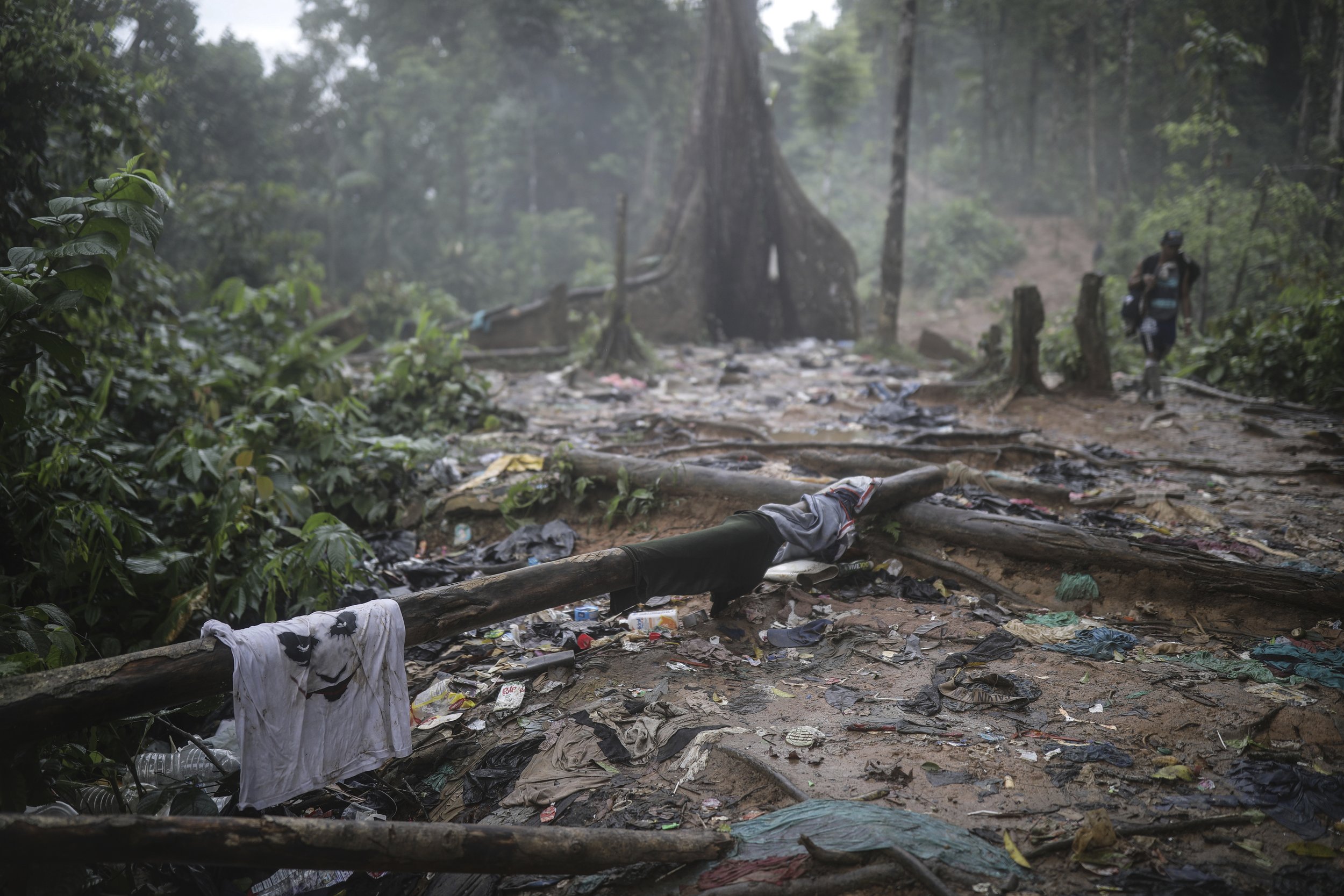  Clothing and garbage litter the trail where migrants have been trekking across the Darien Gap from Colombia to Panama in hopes of eventually reaching the United States, on May 10, 2023. (AP Photo/Ivan Valencia) 