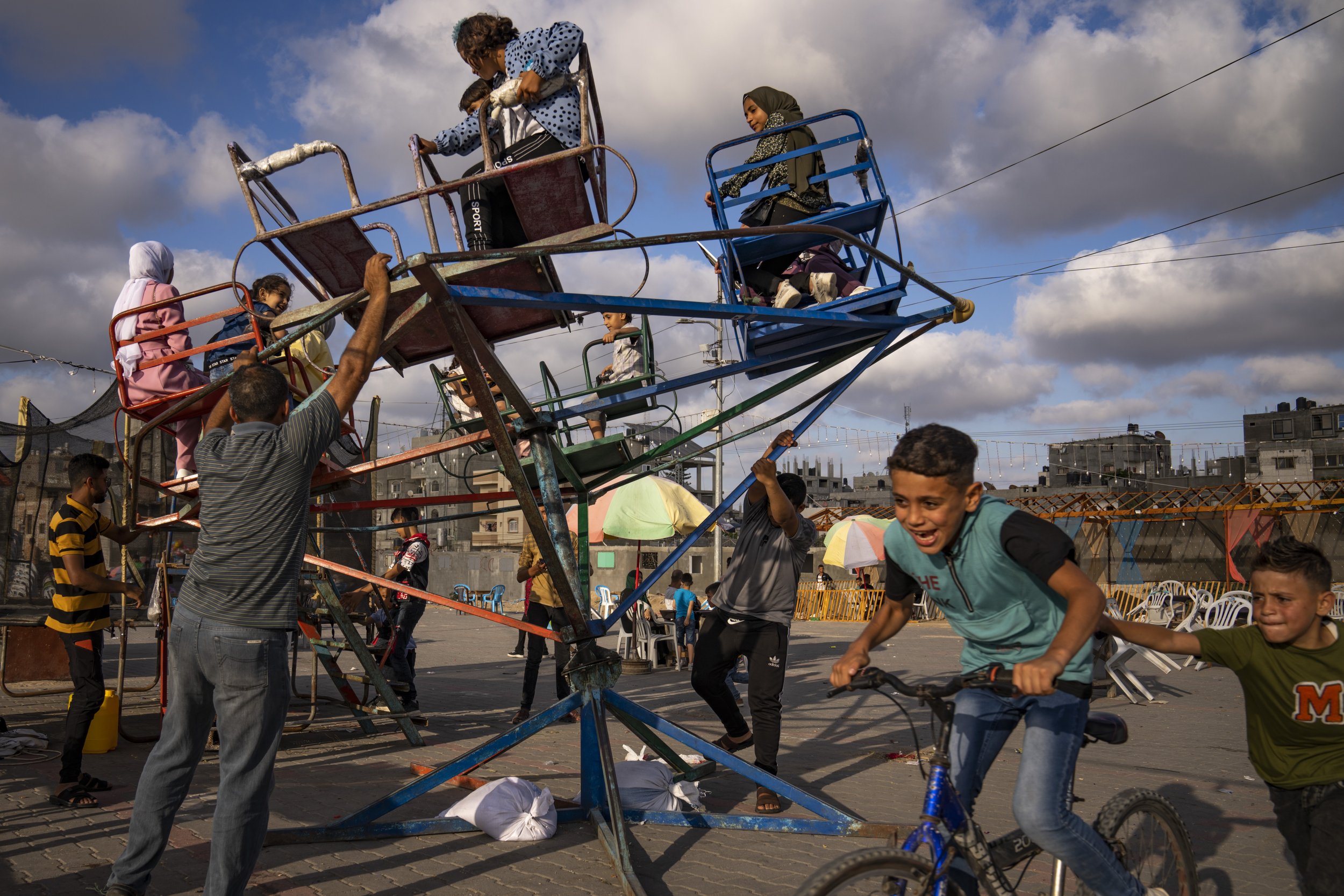  Palestinians celebrate the Eid al-Adha holiday at Nusseirat refugee camp, central Gaza Strip, on June 29, 2023. (AP Photo/Fatima Shbair) 