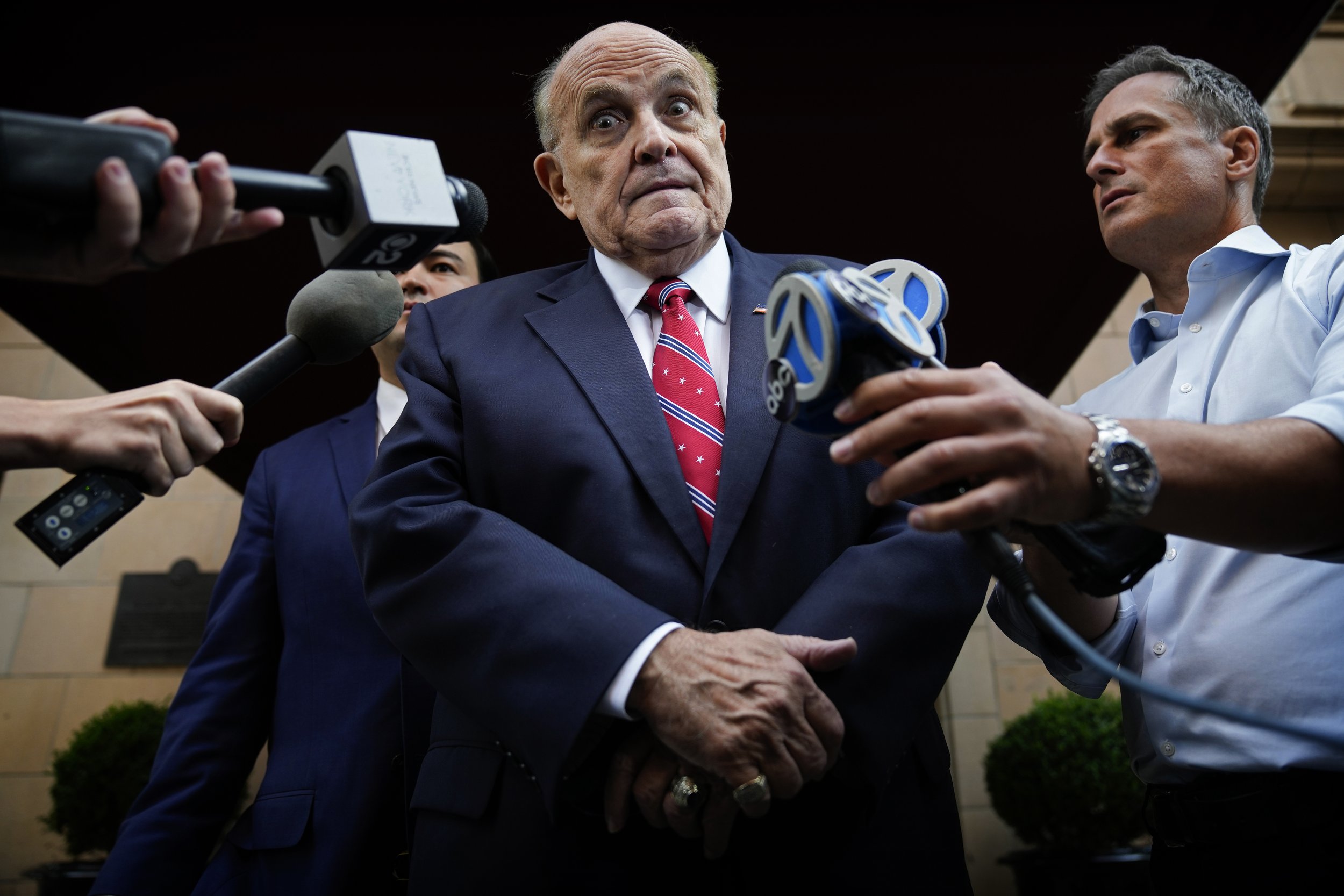  Former Mayor of New York Rudy Giuliani speaks to reporters as he leaves his apartment building in New York on Aug. 23, 2023. (AP Photo/Seth Wenig) 