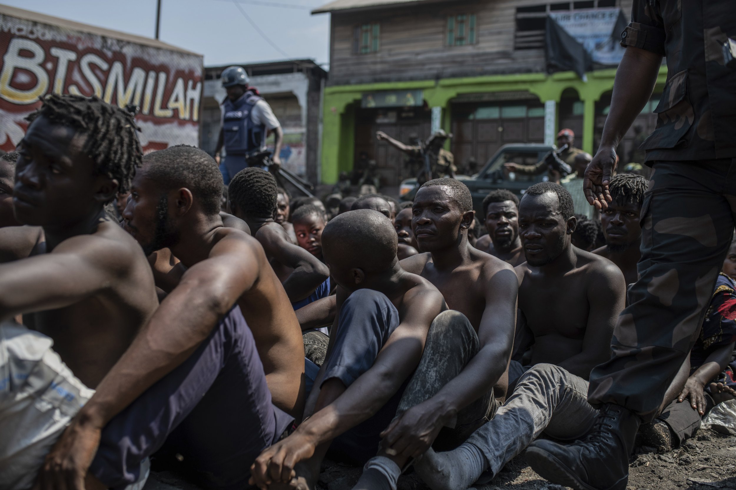  Arrested members of the Wazalendo sect are seated and lined up in Goma, Democratic Republic of the Congo, on Aug. 30, 2023. More than 40 people died and dozens were injured in clashes in Goma between protesters from the Wazalendo religious sect and 