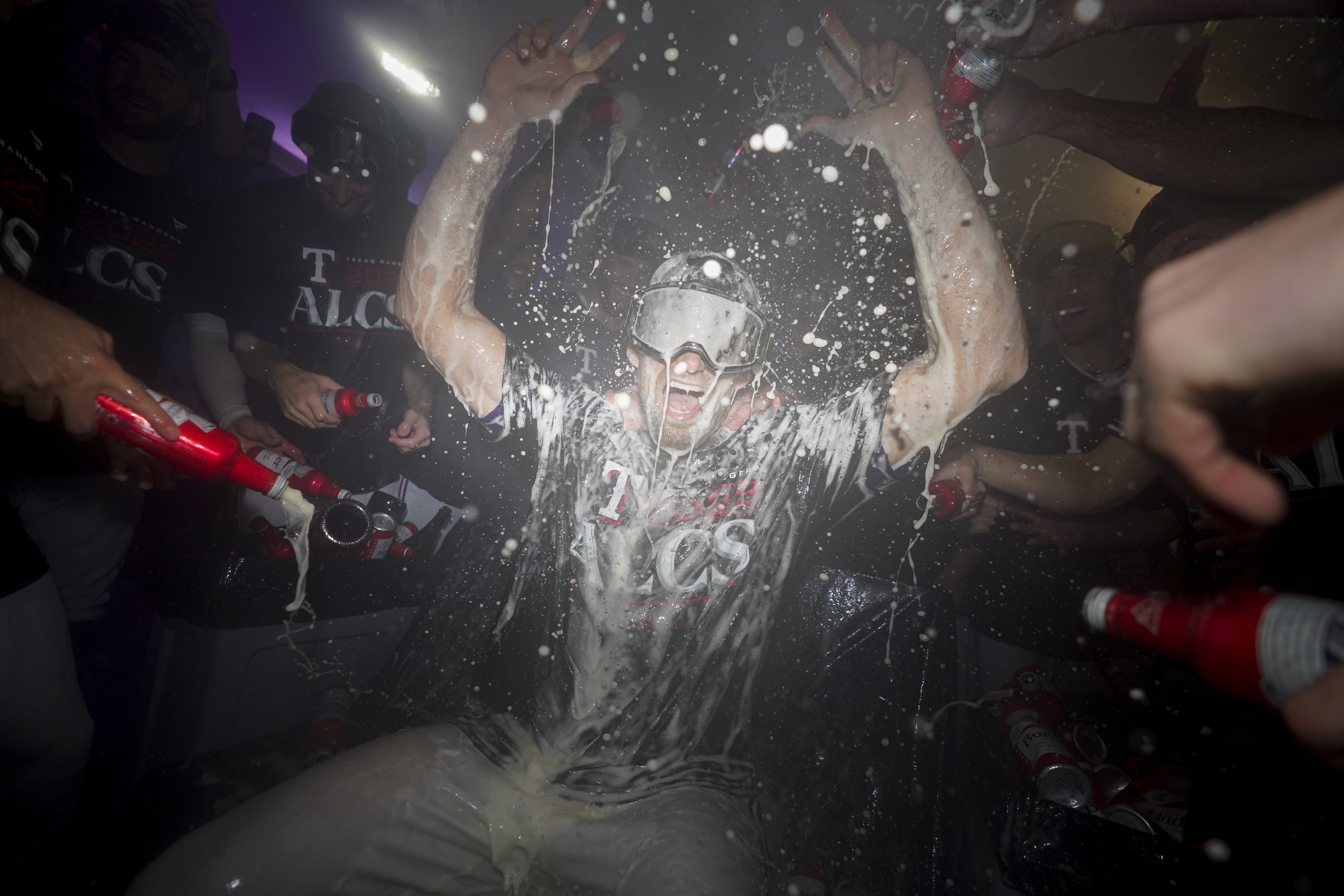  Texas Rangers starting pitcher Nathan Eovaldi celebrates with teammates after winning an American League Division Series baseball game against the Baltimore Orioles in Arlington, Texas, on Oct. 10, 2023. (AP Photo/Julio Cortez) 