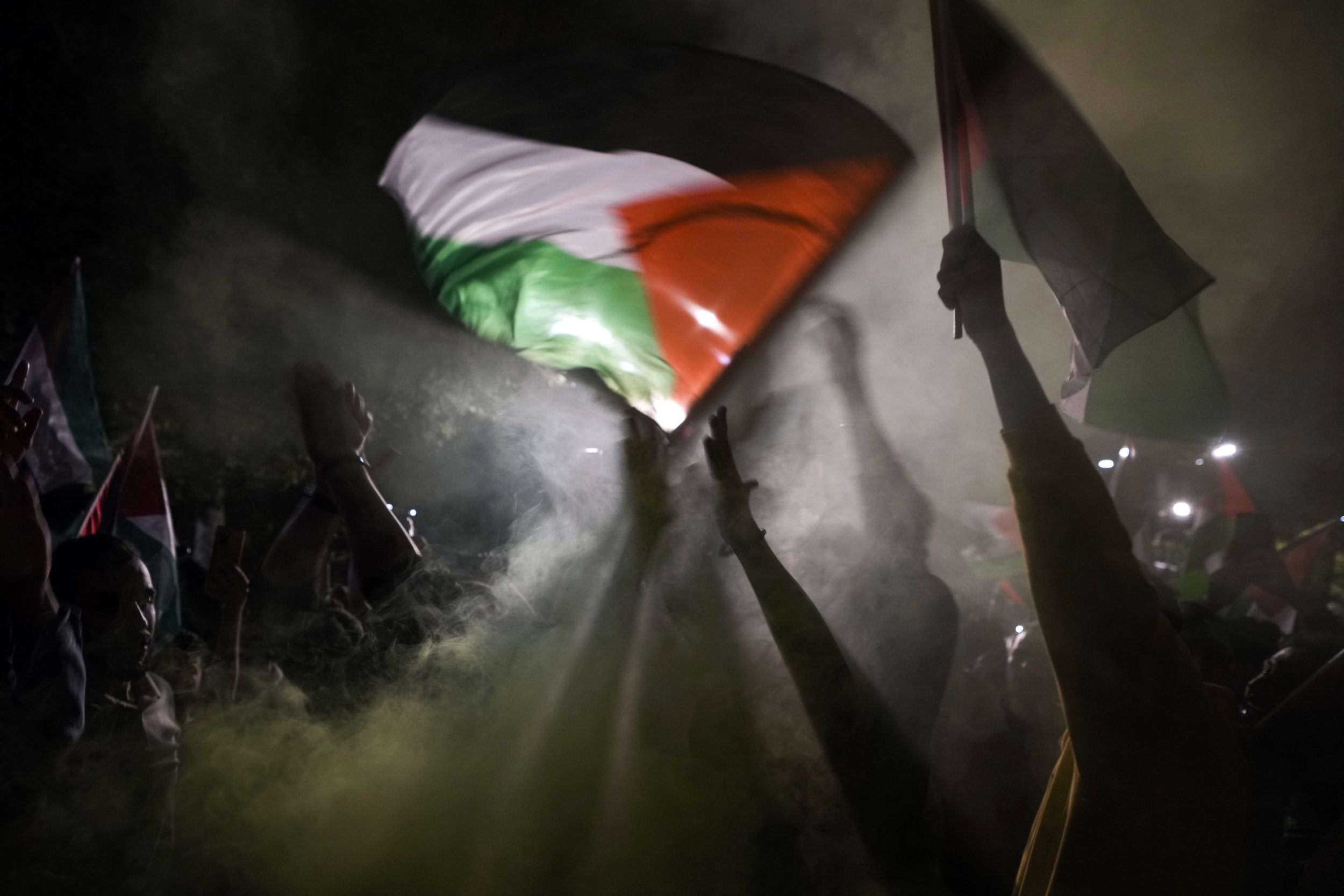  People chant anti-Israel slogans while waving Palestinian flags during a rally celebrating the attacks that the militant Hamas group carried out against Israel earlier the same day, in Istanbul, Turkey, on Oct. 7, 2023. (AP Photo/Khalil Hamra) 