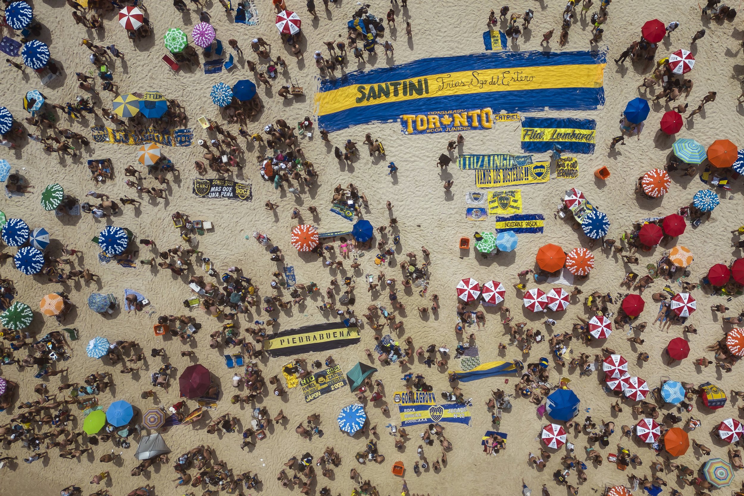  Argentine Boca Juniors fans gather on Copacabana beach the day before their team faces Brazil's Fluminense at the Copa Libertadores championship match in Rio de Janeiro, Brazil, on Nov. 3, 2023. (AP Photo/Bruna Prado) 