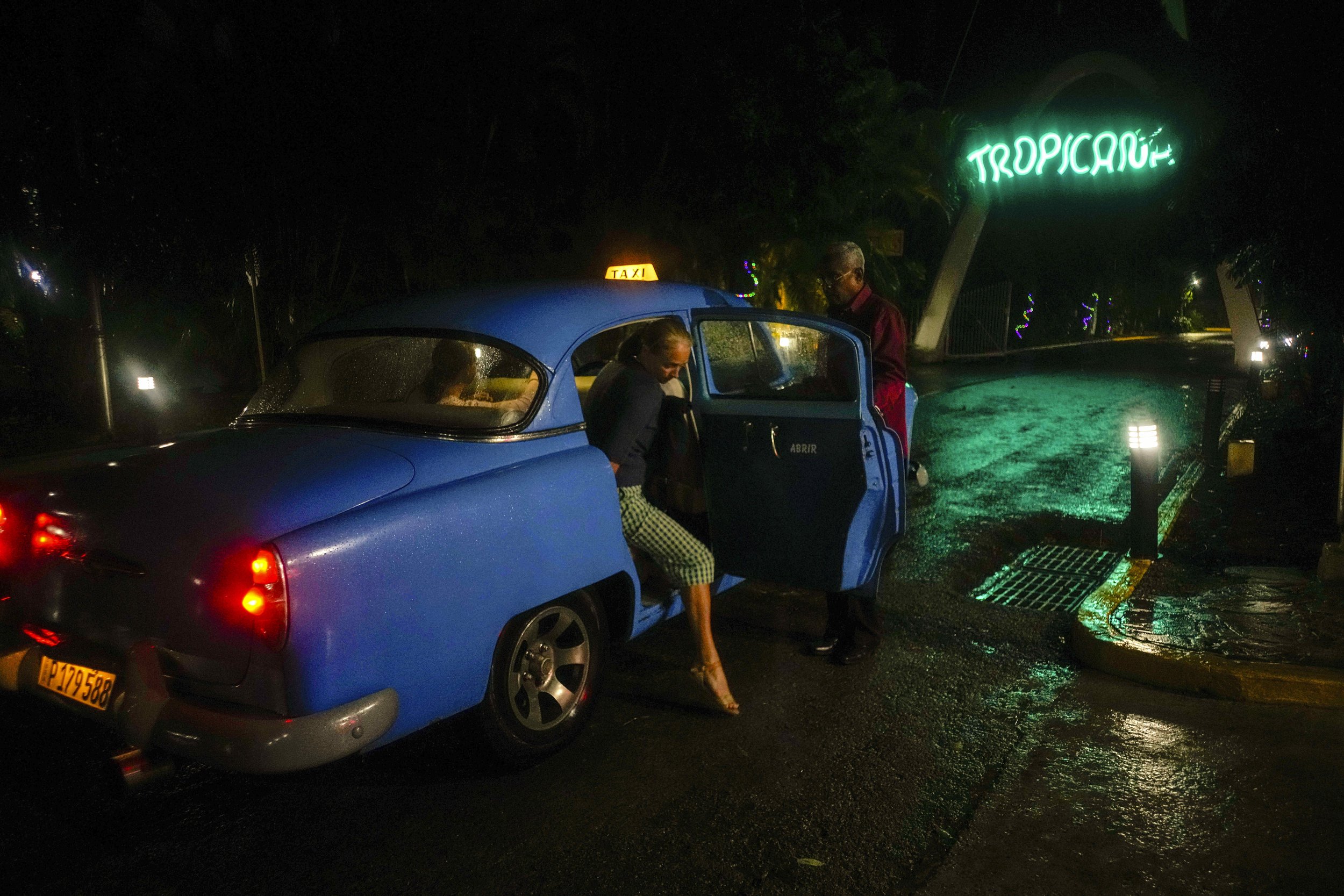  A tourist arrives in a classic American car for a cabaret show at the Tropicana performance hall in Havana, Cuba, on Nov. 2, 2023. (AP Photo/Ramon Espinosa) 