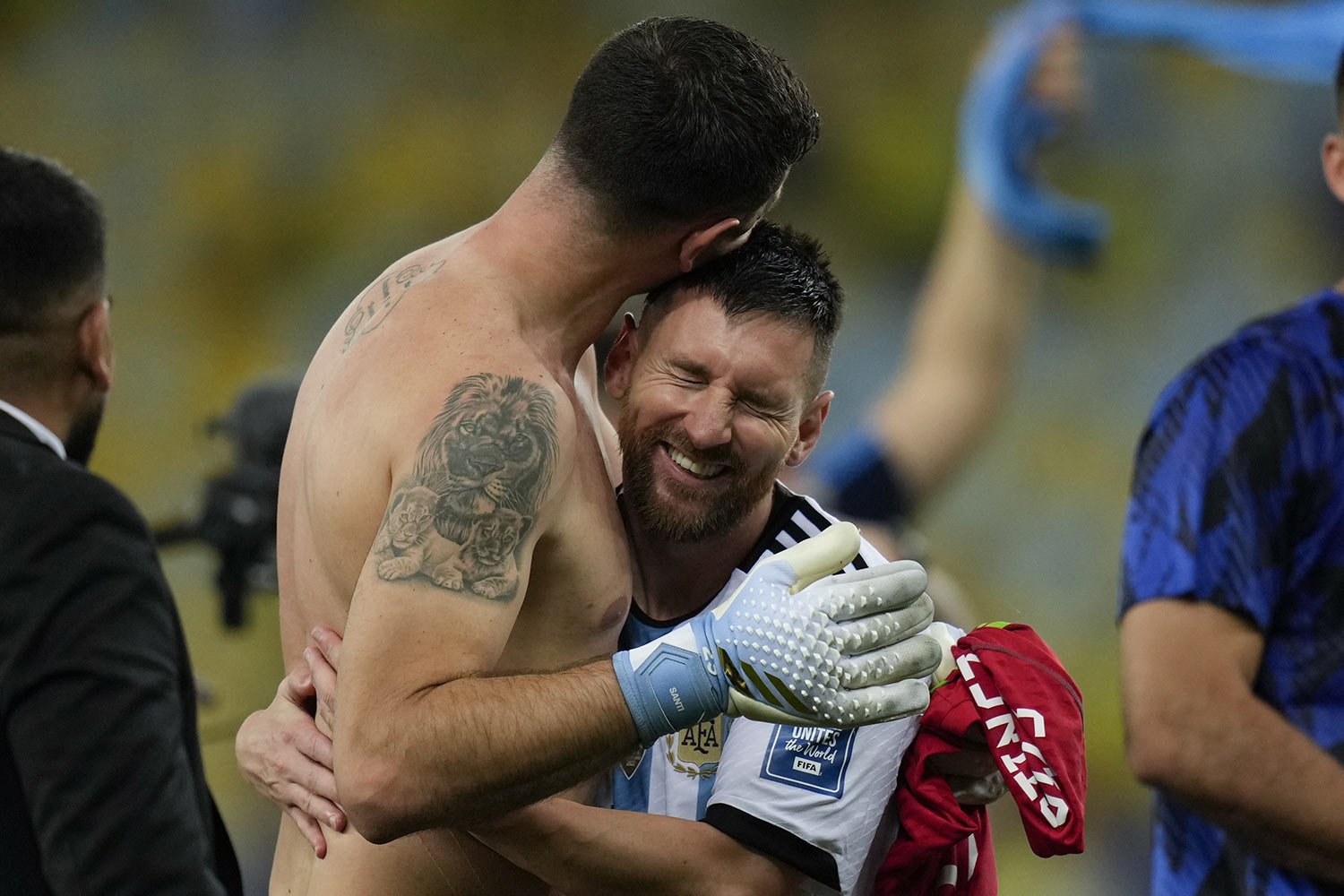  Argentina's Lionel Messi embraces goalkeeper Emiliano Martinez as they celebrate their team's 1-0 victory over Brazil at the end of a qualifying soccer match for the FIFA World Cup 2026 at Maracana stadium in Rio de Janeiro, Brazil, Nov. 21, 2023. (